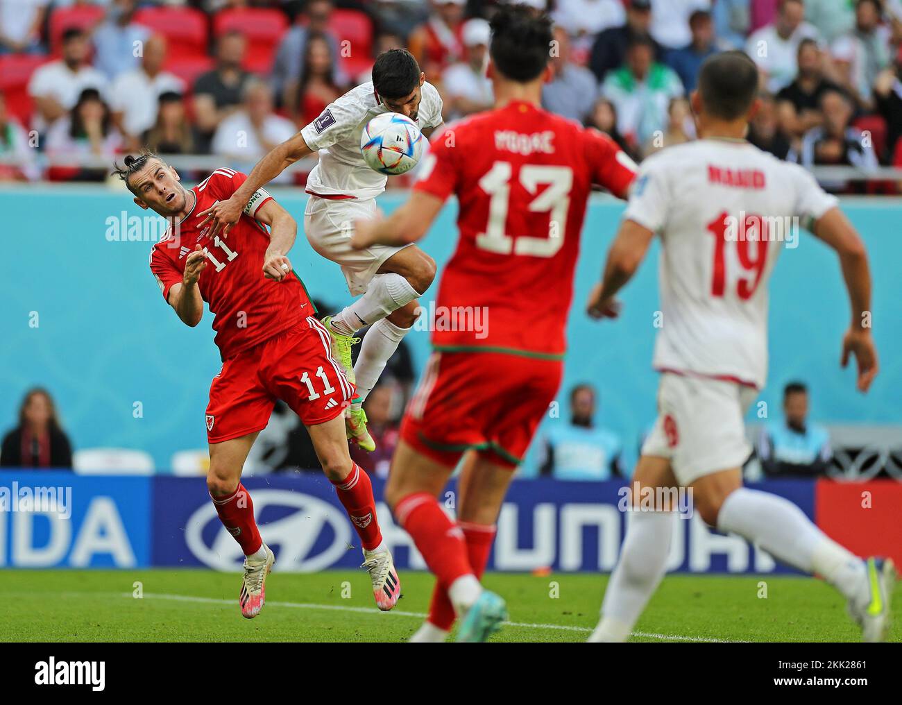 Doha, Qatar. 25th Nov, 2022. Gareth Bale of Wales disputes the bid with Milad Mohammadi of Iran, during the match between Wales and Iran, for the 2nd round of Group B of the FIFA World Cup Qatar 2022, Ahmed bin Ali Stadium this Friday 25. 30761 (Heuler Andrey/SPP) Credit: SPP Sport Press Photo. /Alamy Live News Stock Photo