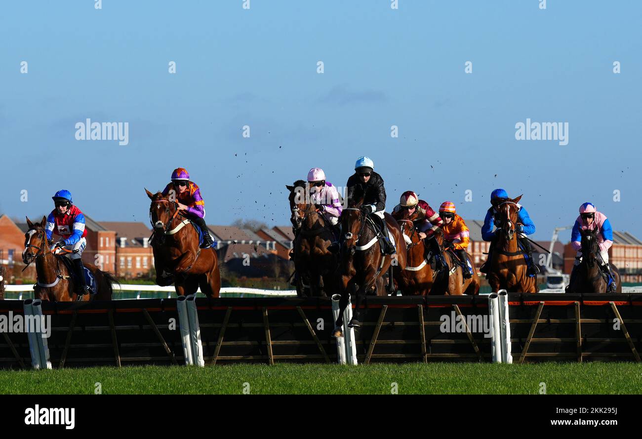 Russian Ruler ridden by Nico de Boinville leads the field on the first lap of The Coral Get Closer To The Action Novices’ Hurdle during Long Distance Hurdle Day, part of the Coral Gold Cup Meeting at Newbury Racecourse, Berkshire. Picture date: Friday November 25, 2022. Stock Photo