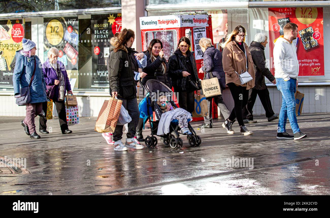 Dundee, Tayside, Scotland, UK. 25th Nov, 2022. Black Friday: A cold and sunny November morning in Northeast Scotland, with temperatures reaching 8°C. Black Friday shoppers are out and about in Dundee's city centre looking for Black Friday deals. Local residents People in Dundee are still rushing to the shops, despite the reality that inflation is at a 41-year high of 11.1%. Credit: Dundee Photographics/Alamy Live News Stock Photo