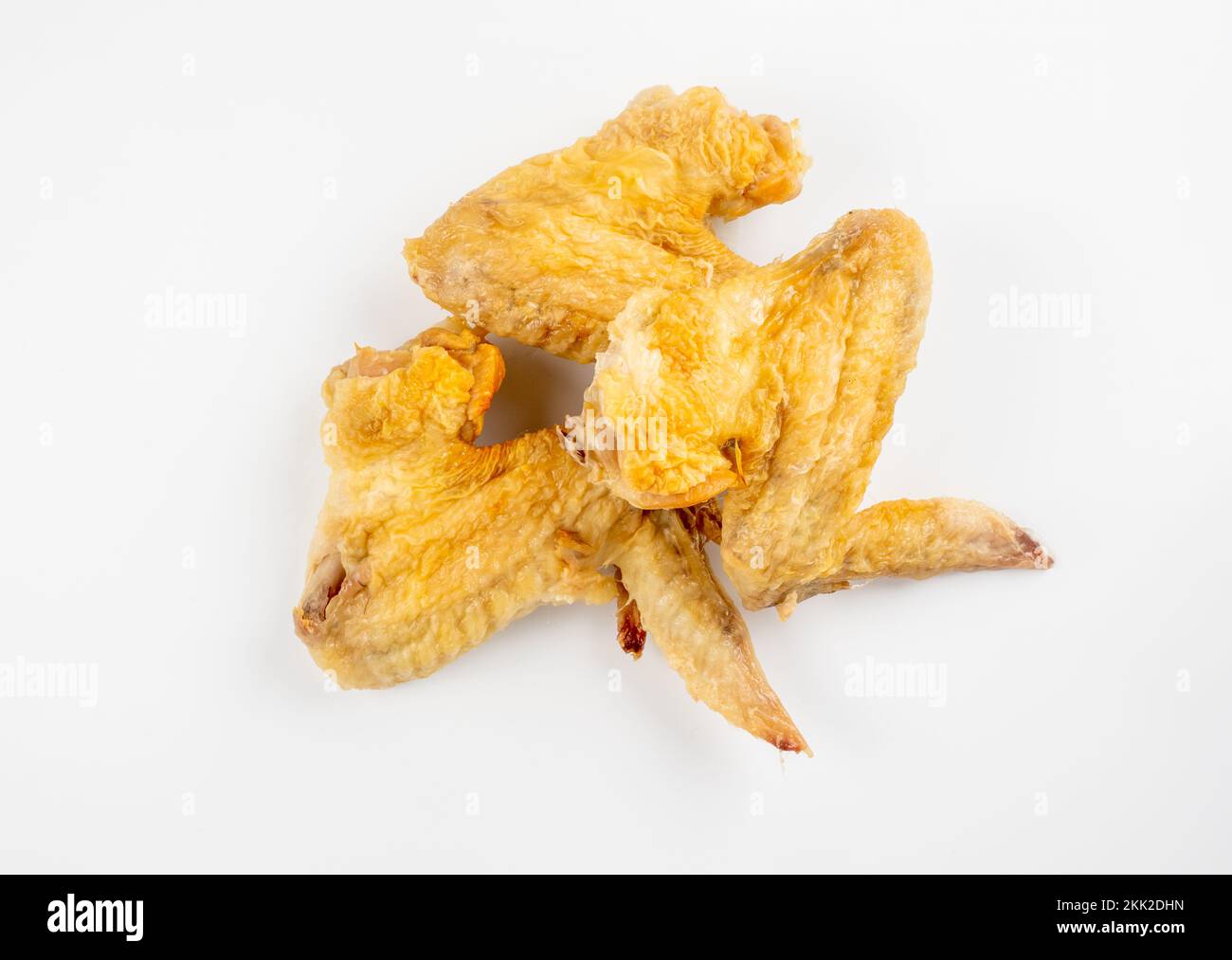 trio of roast chicken wings isolated on a white background Stock Photo