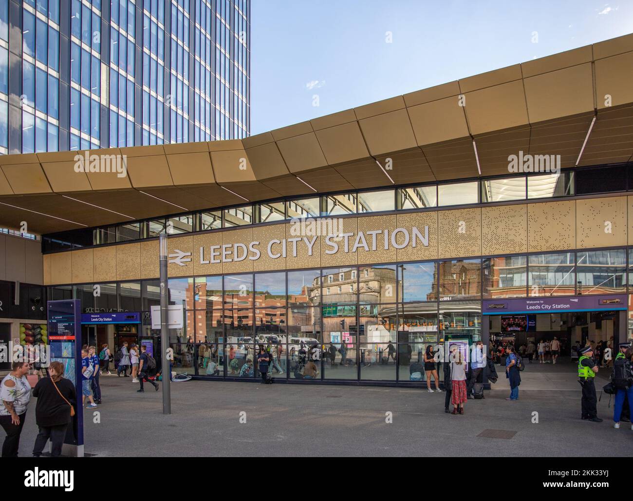 The exterior of the Leeds City railway station crowded entrance in