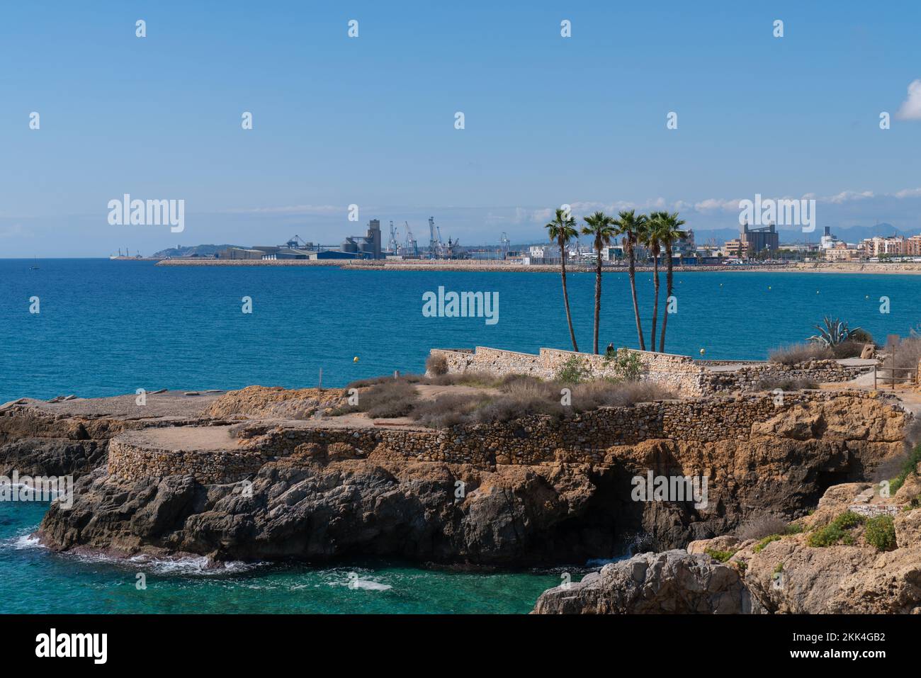 Tarragona Spain palm trees and port blue Mediterranean sea spanish coast city Stock Photo