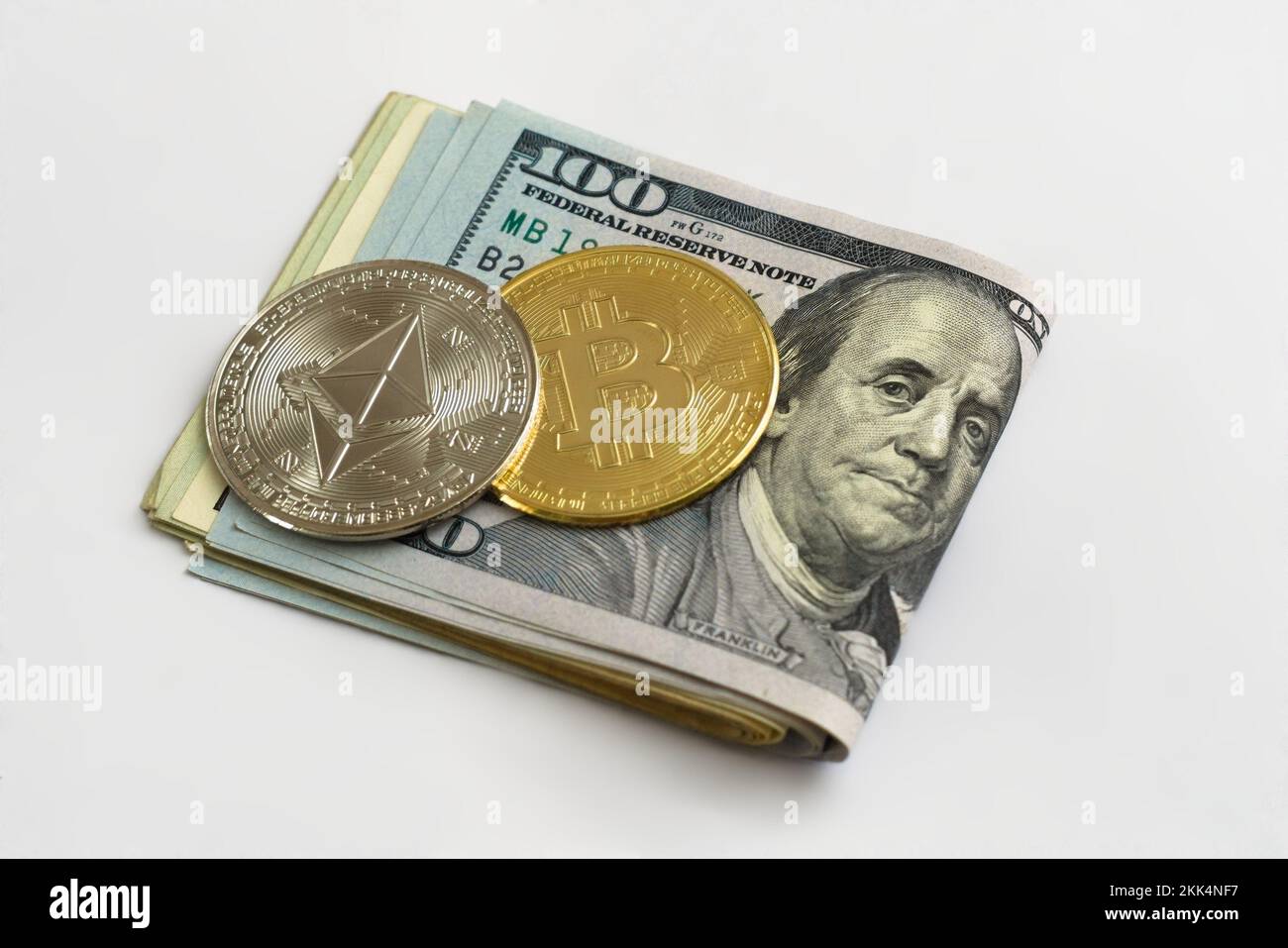 Ethereum on one hundred dollar banknote. Silver coin with Ethereum icon.  Digital crypto currency technology. Bitcoins in the background in silver  and Stock Photo - Alamy