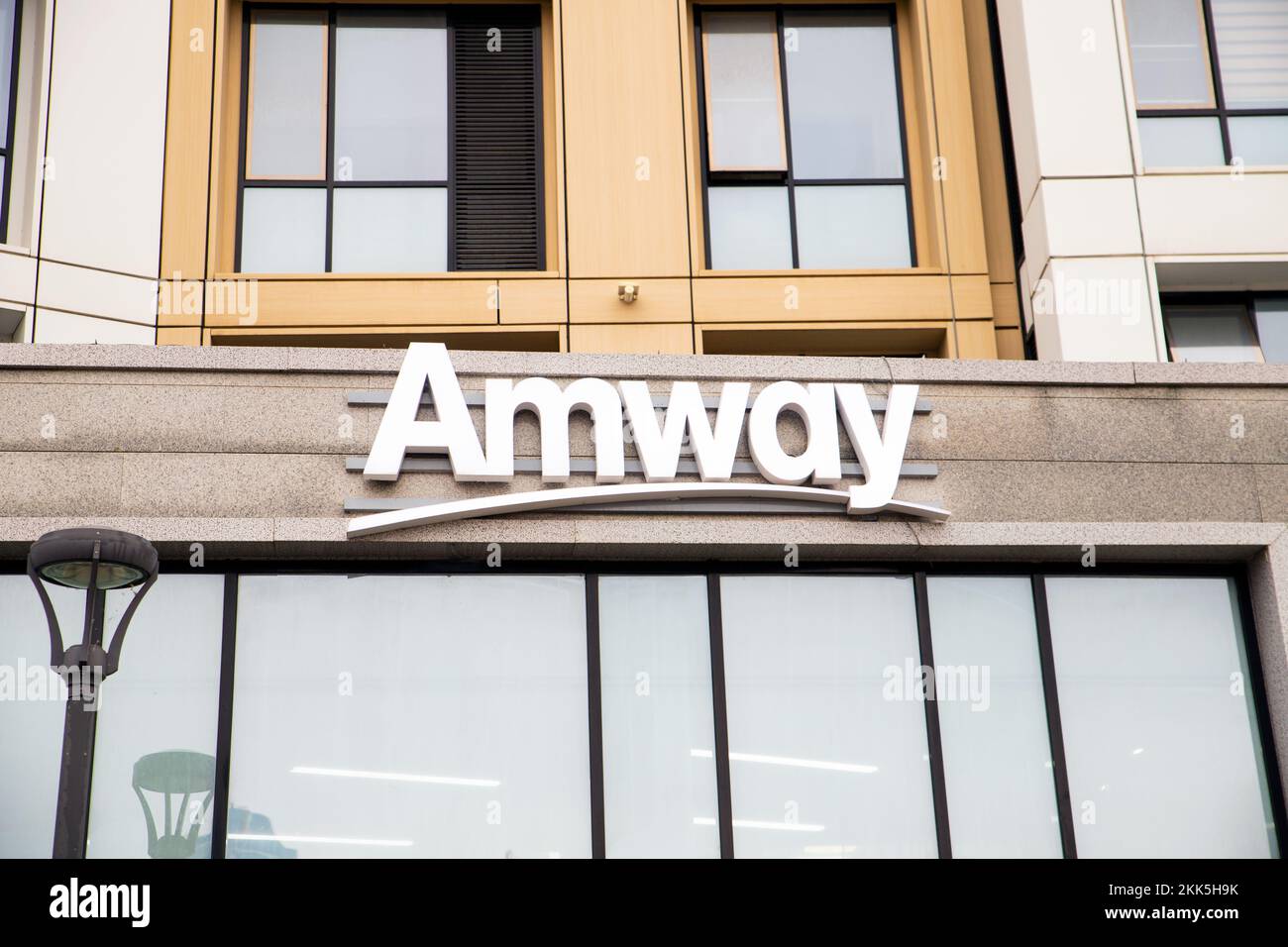Astana, Kazakhstan 10.22.2022 white Amway sign on facade of building
