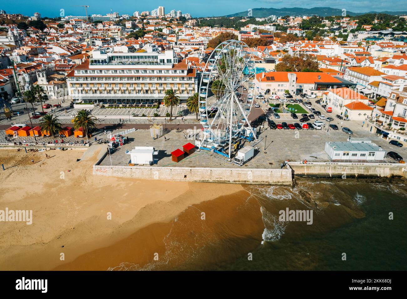 Aerial view of Cascais bay, Portugal with giant ferris wheel visible which was set up for the Christmas season Stock Photo