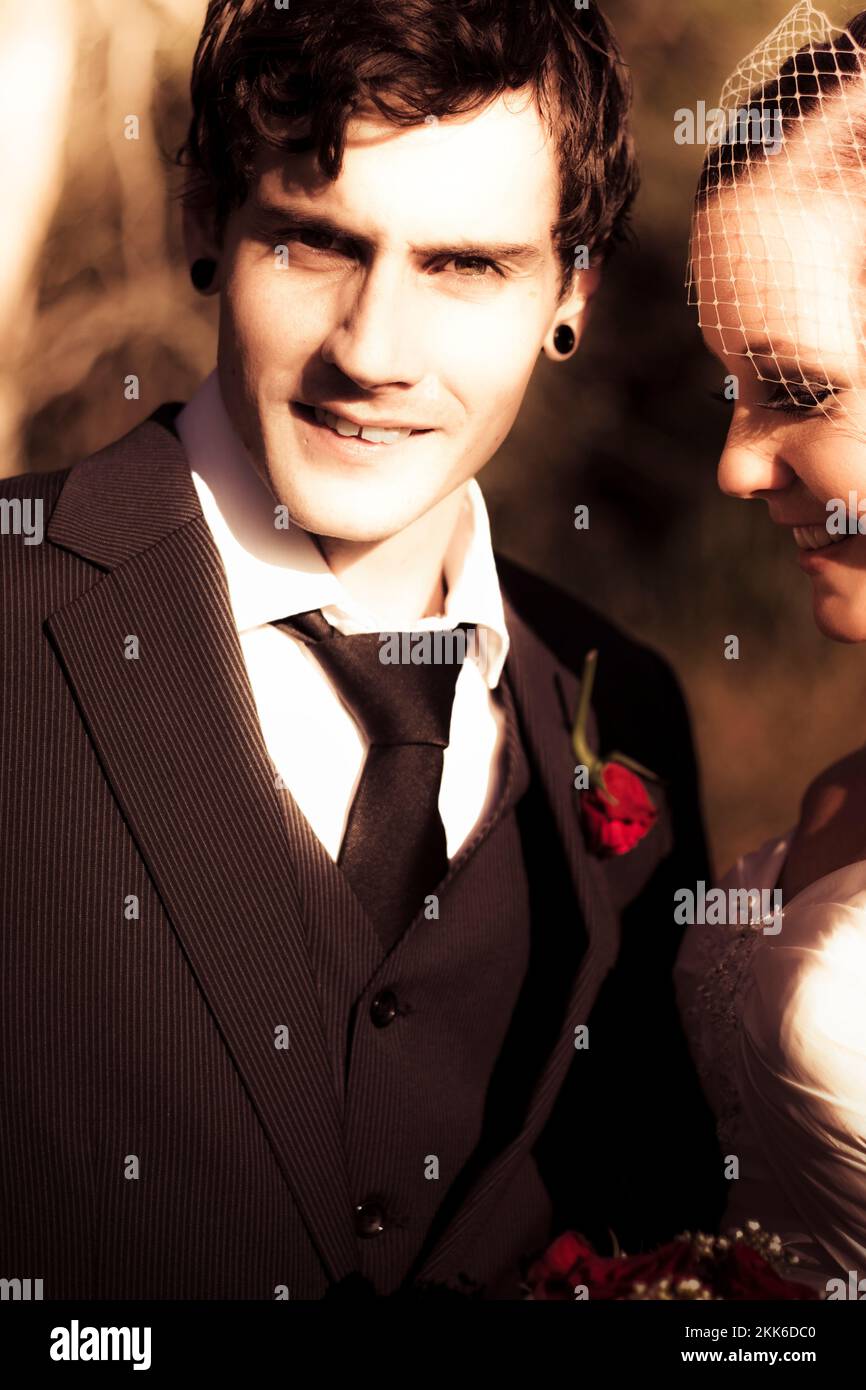 Sepia Tone Photo Of A Handsome And Vintage Young Groom At His Wedding Posed With His Smiling 6661