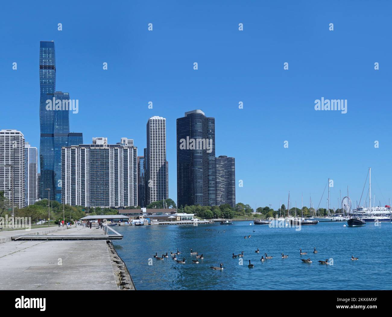 Chicago waterfront park with high rise apartment buildings in the