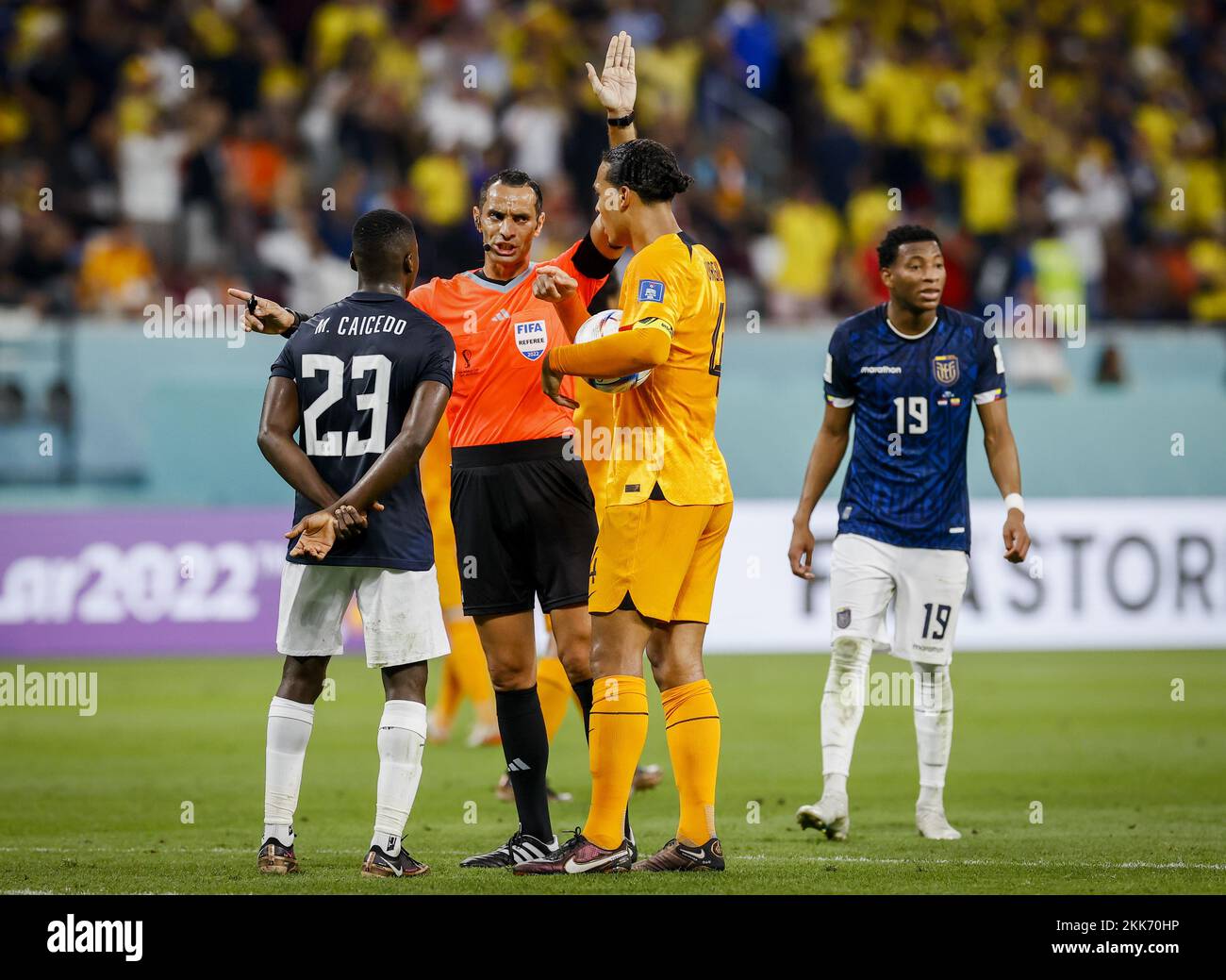 ALRAYYAN (LR) Moises Caicedo of Ecuador, referee Mustapha Ghorbal