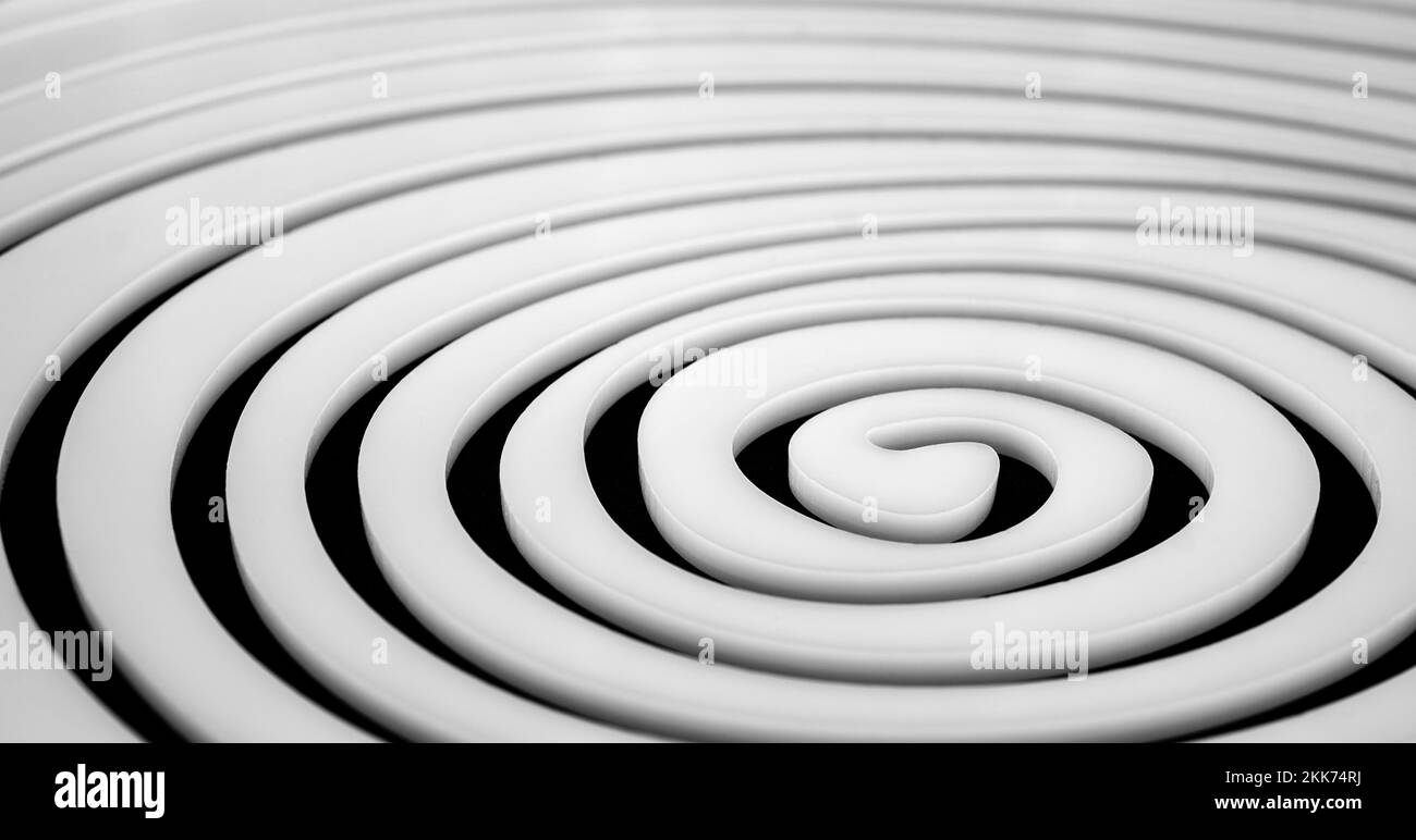 Simple white spiral on black background Stock Photo - Alamy