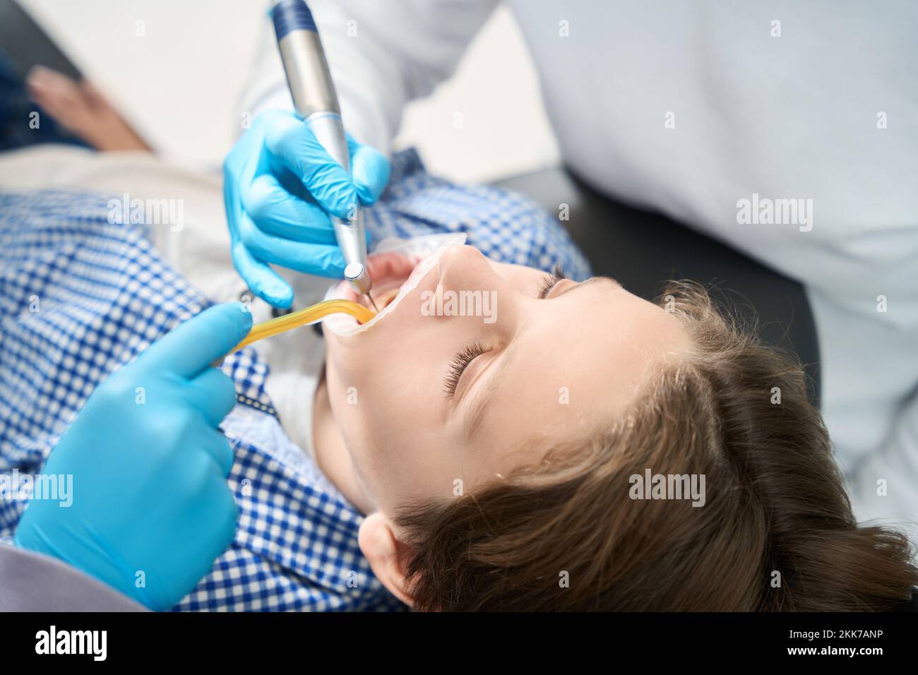 Teenager at a dentist appointment in a medical institution Stock Photo