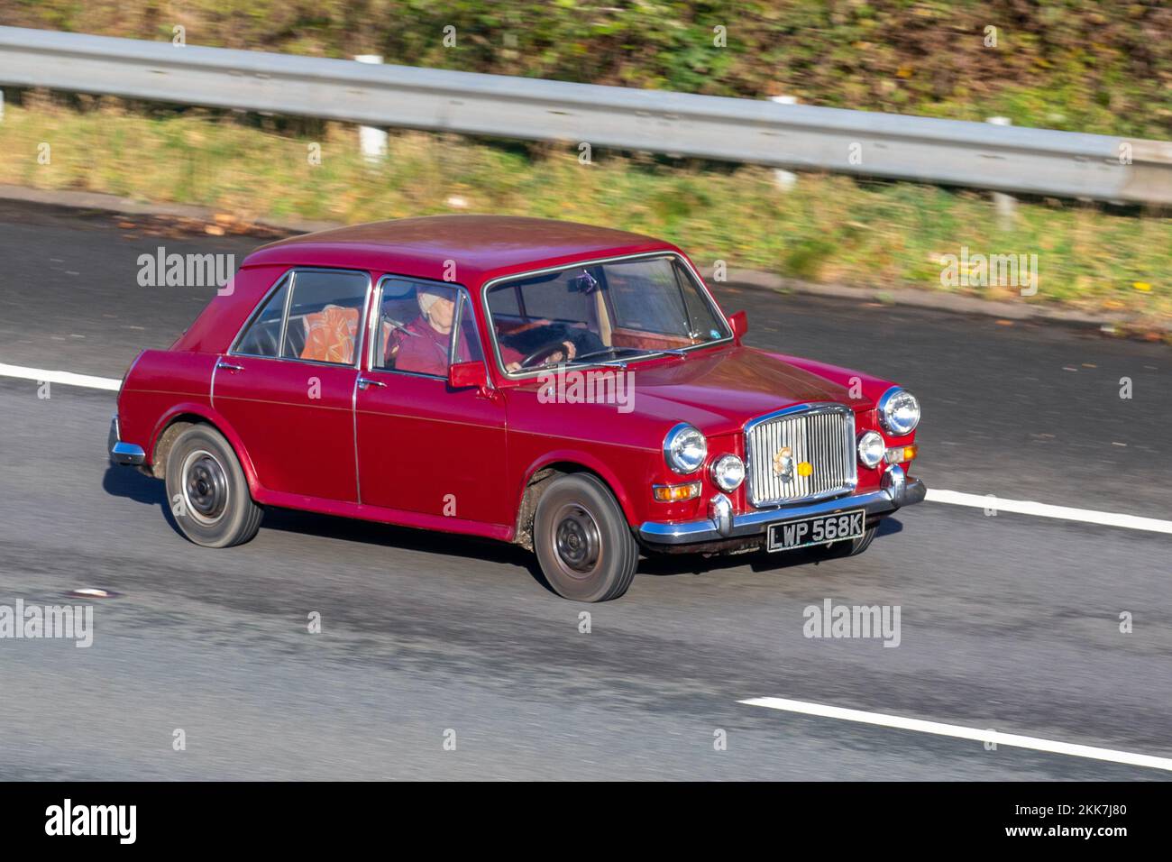 1972, 70s, seventies Red Vanden Plas 1300 Princess, a version of the Austin A99 Westminster; travelling on the M6 motorway, UK Stock Photo