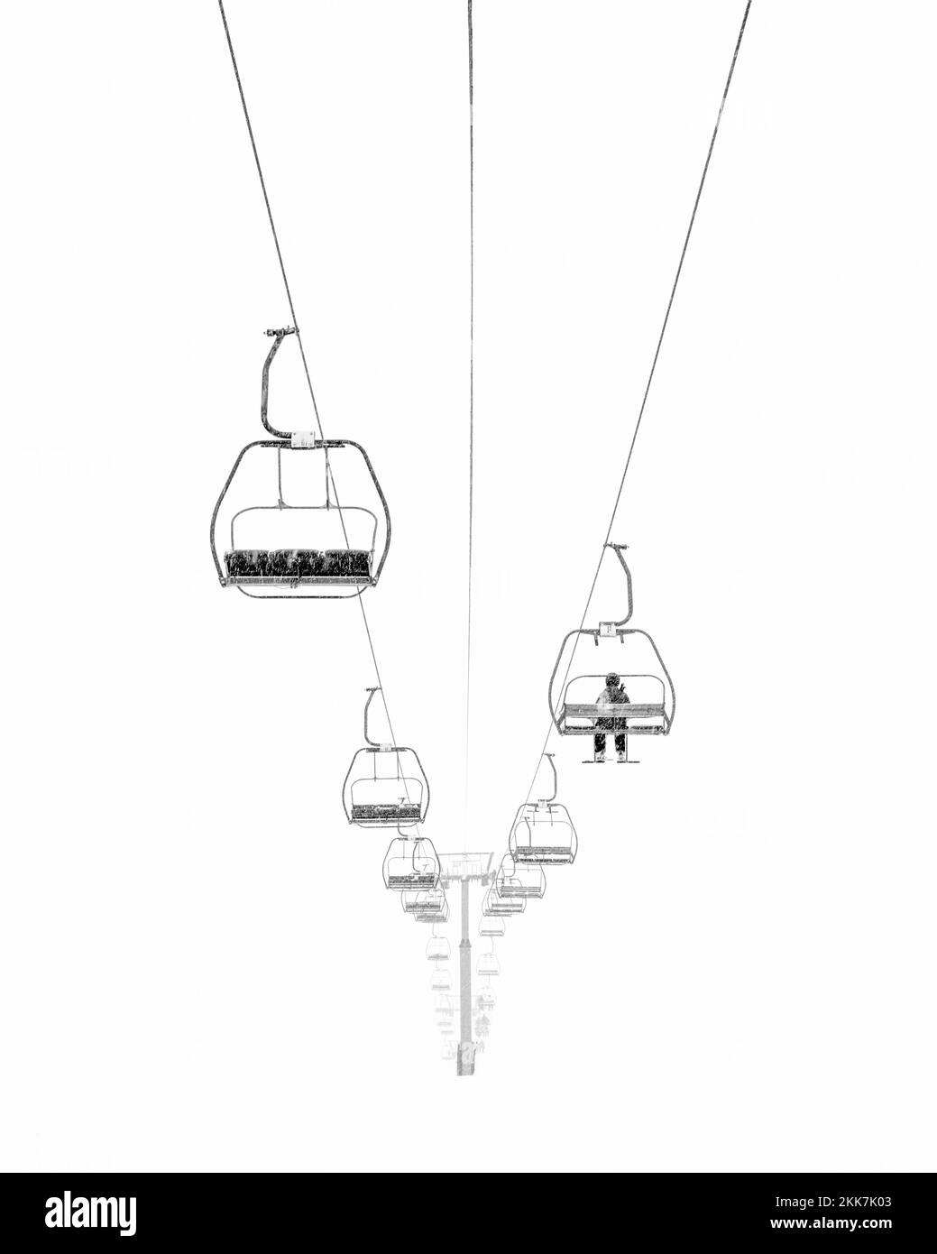 A vertical shot of cable cars riding in the air in Morzine, France Stock Photo