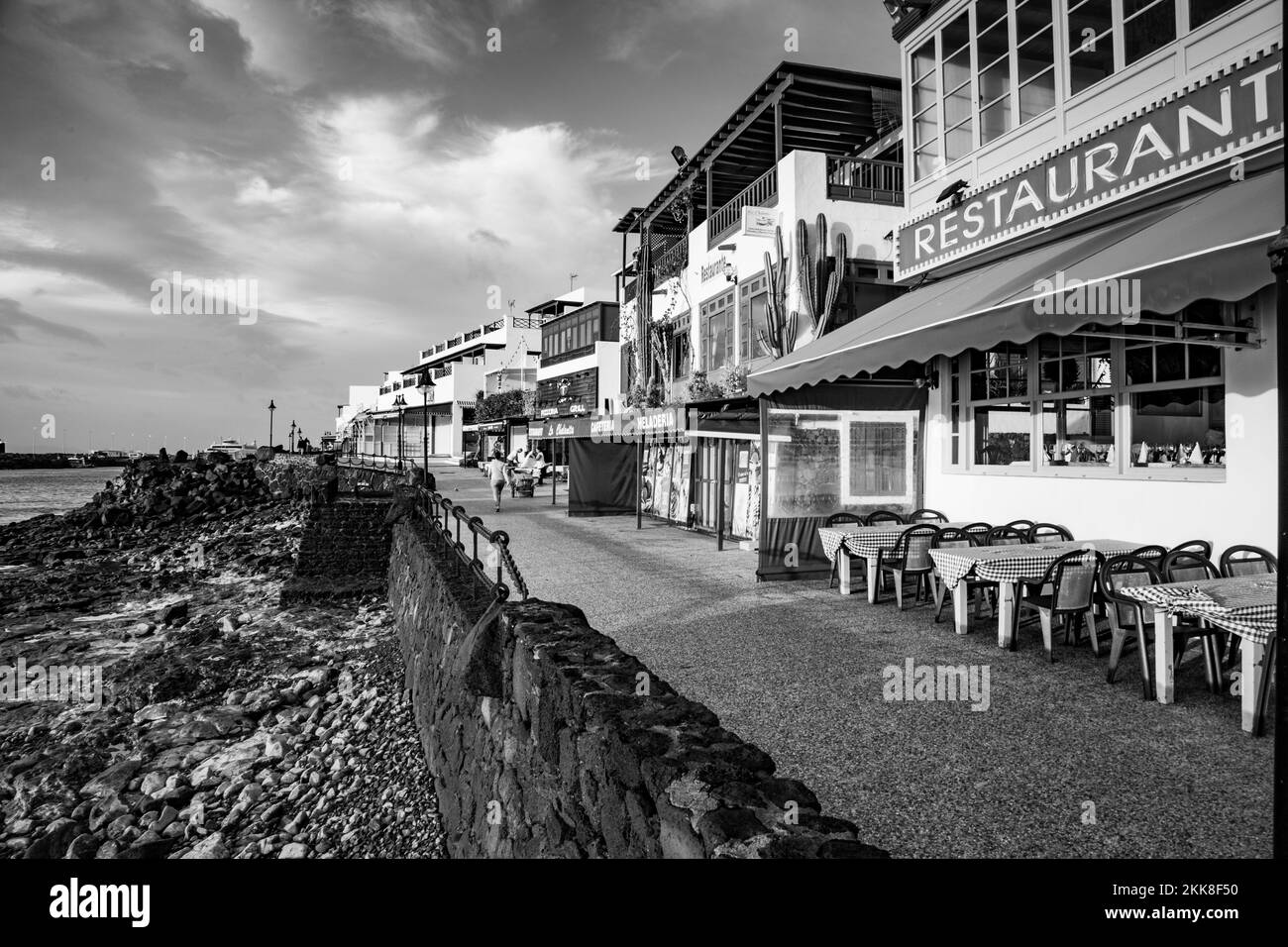 Playa Blanca, Spain - December 22, 2010: view to promenade of Playa Blanca in early morning . Stock Photo