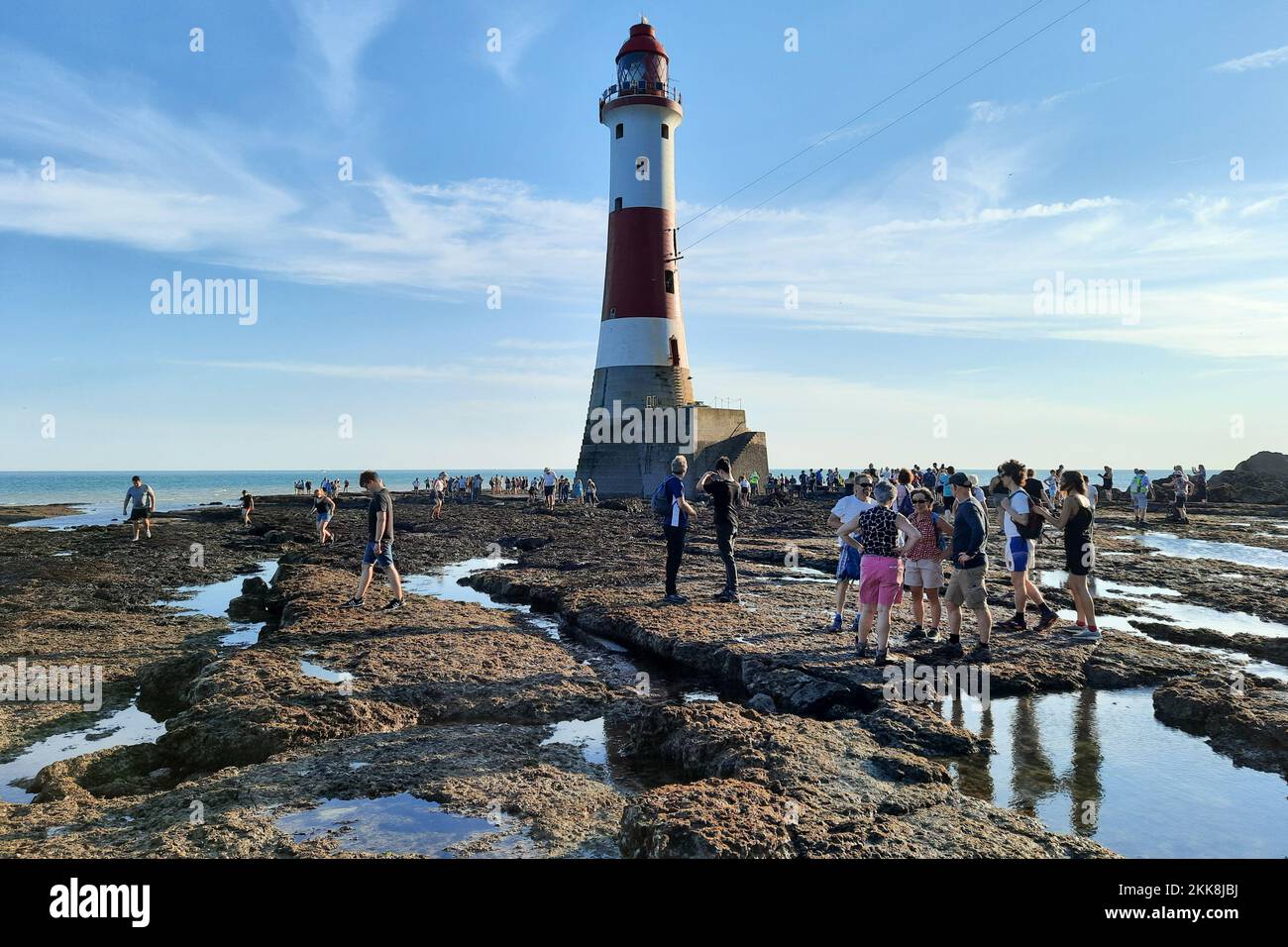 Beachy Head foreshore with lighthouse at low spring tide. East Sussex, UK. Stock Photo