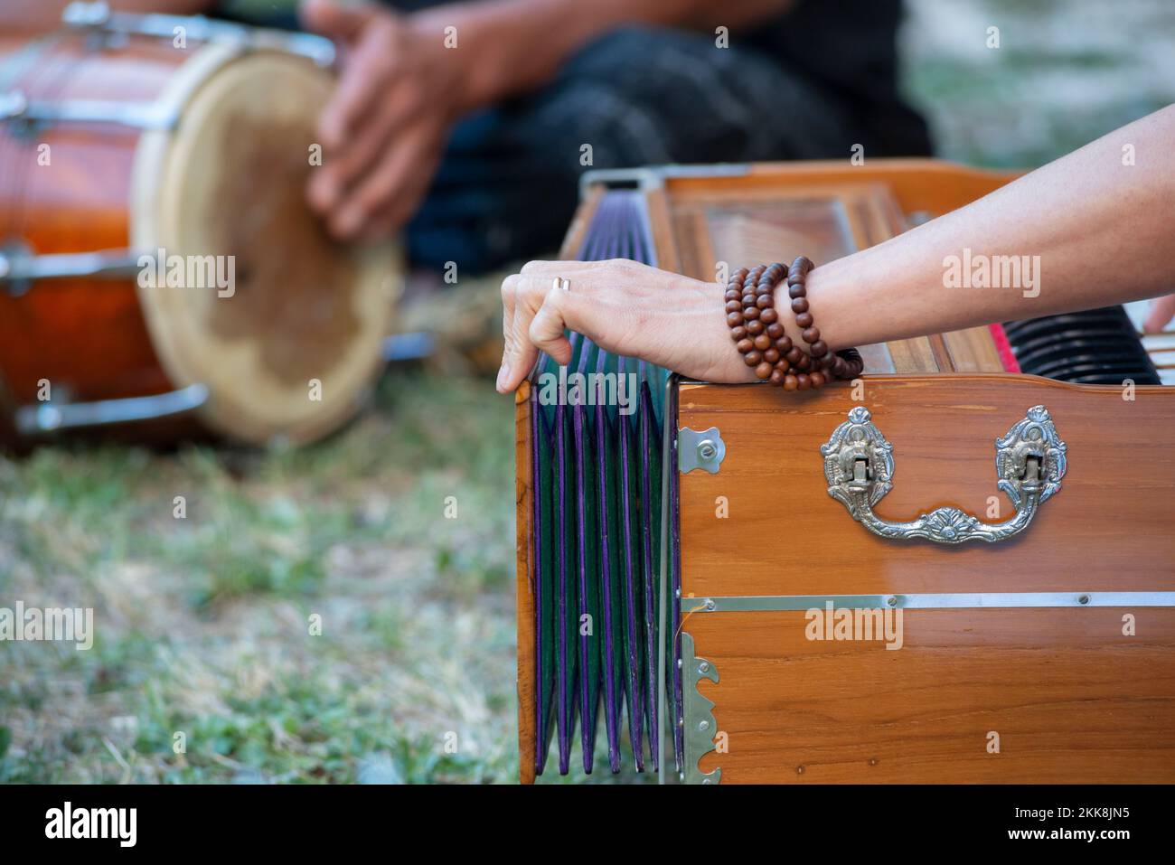 Woman Playing Harmonium Stock Photo