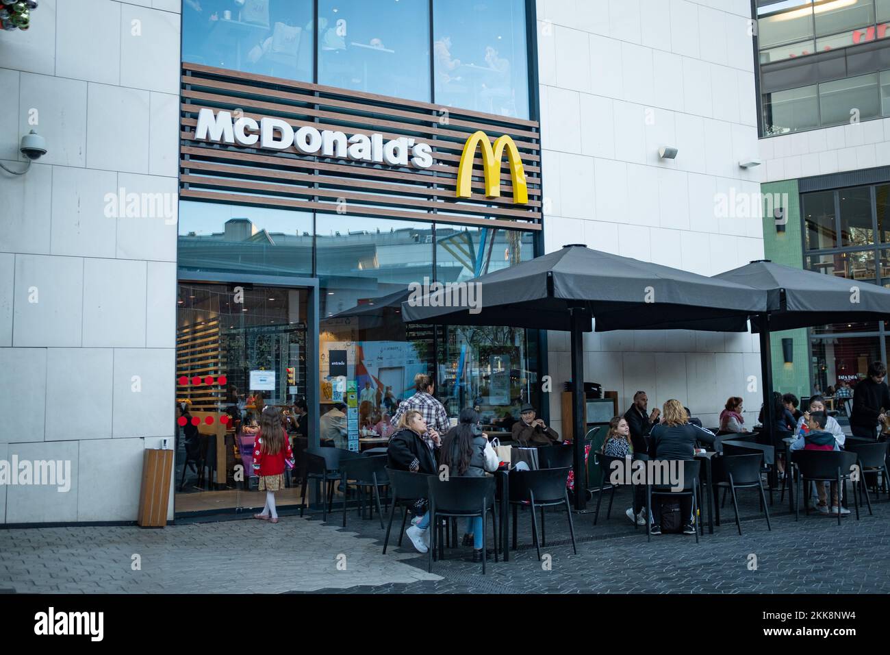 The logo of the fast food company Mcdonalds is seen on top of a ...
