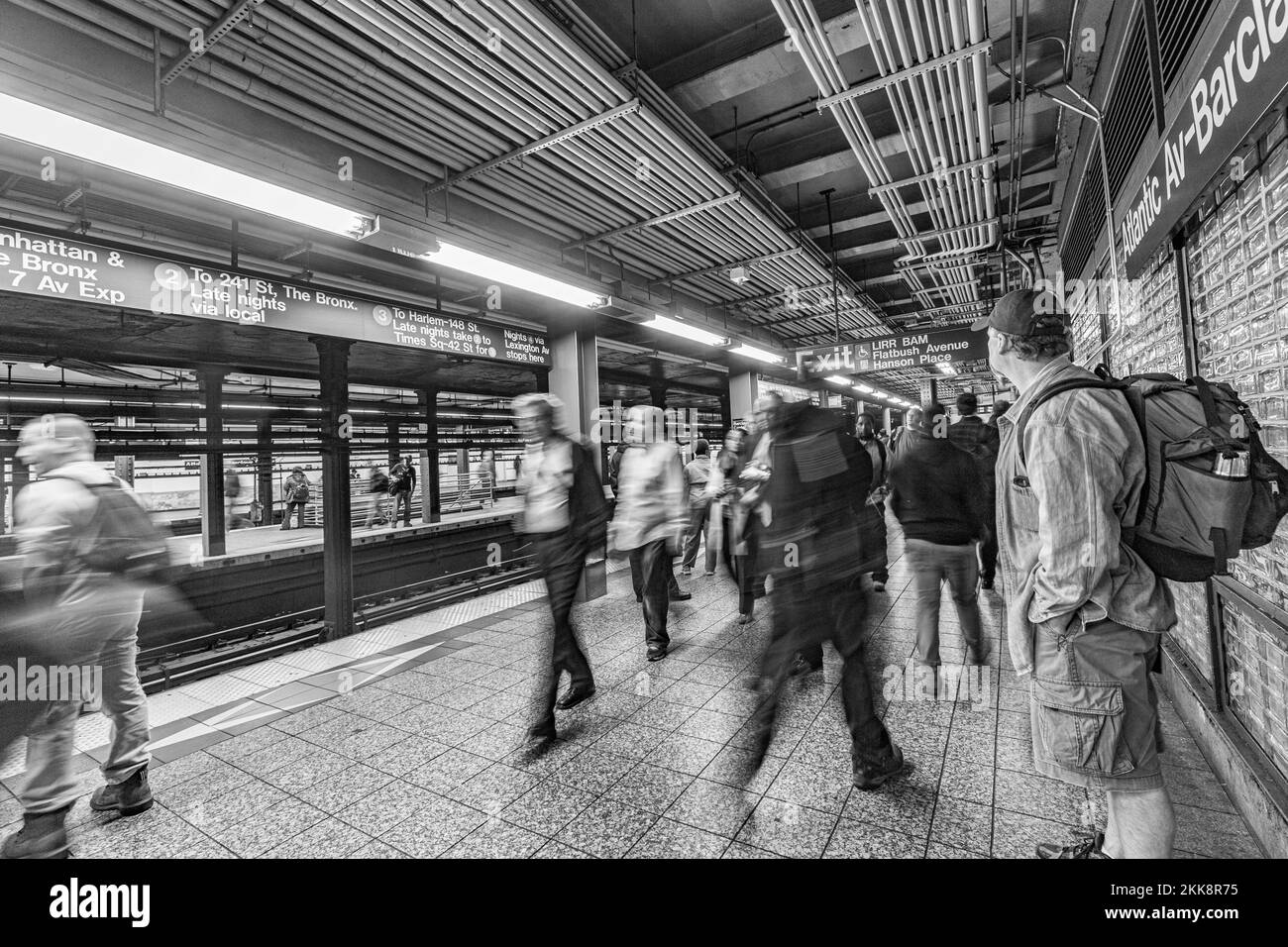 New York, USA - October 21, 2015: People wait at subway station Wall street in New York. With 1.75 billion annual ridership, NYC Subway is the 7th bus Stock Photo