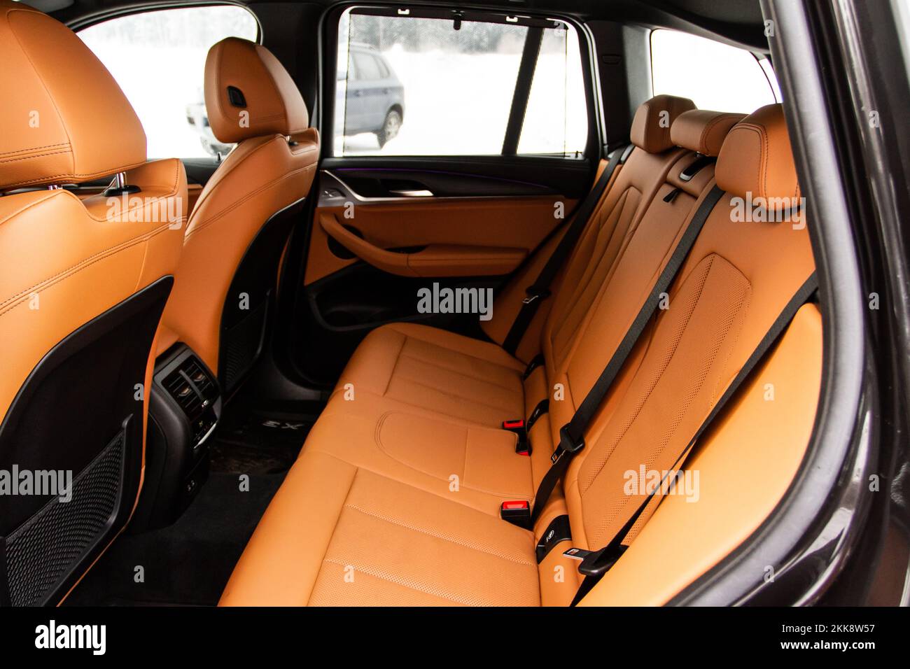 Modern SUV car inside. Leather light back passenger seats in modern luxury car. Comfortable leather seats. Stock Photo