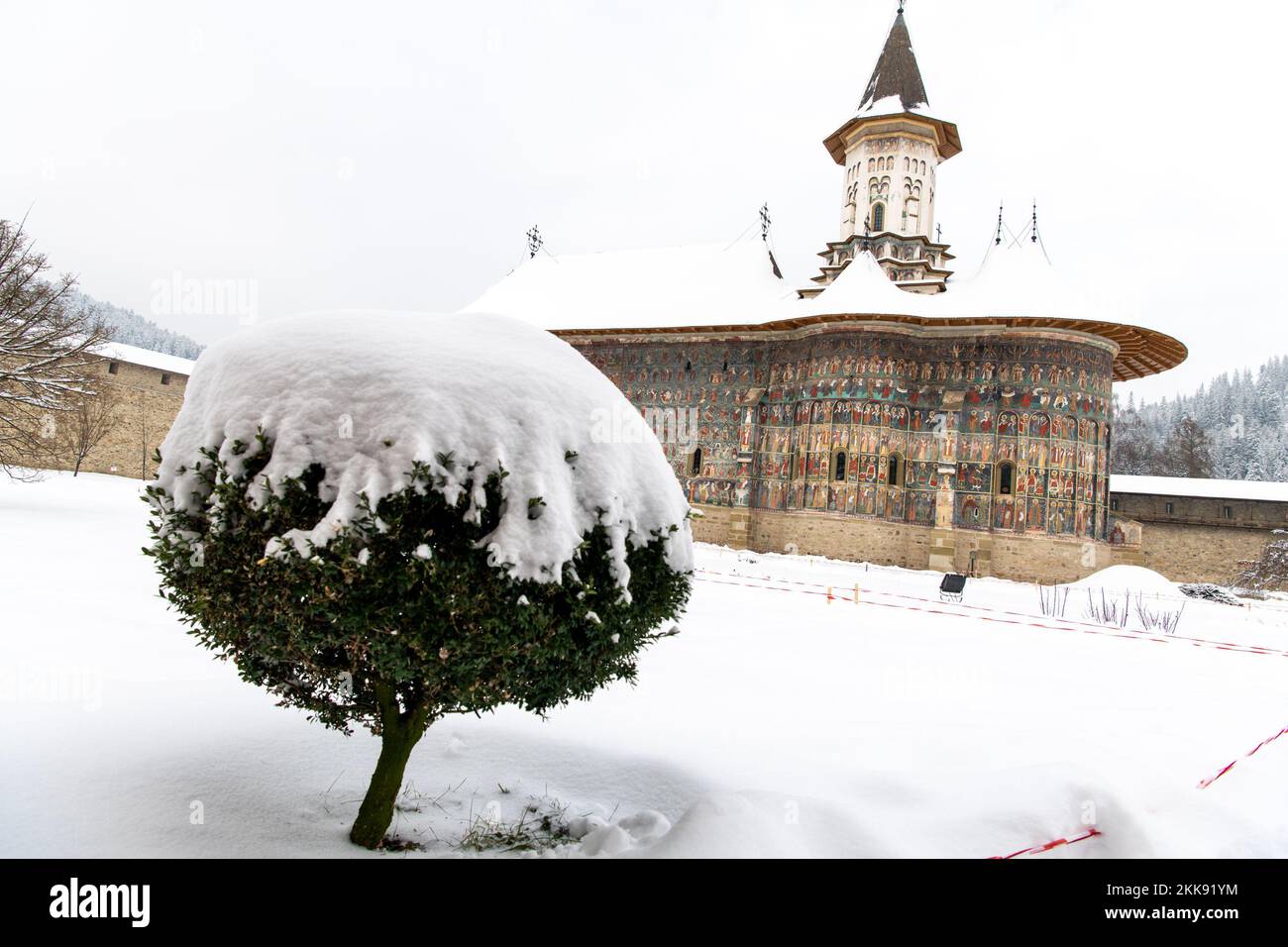 Sucevita, Romania, 2021-12-29. Sucevita Monastery in the Bukovina region under the snow. Their exterior walls are composed of frescoes painted in the Stock Photo