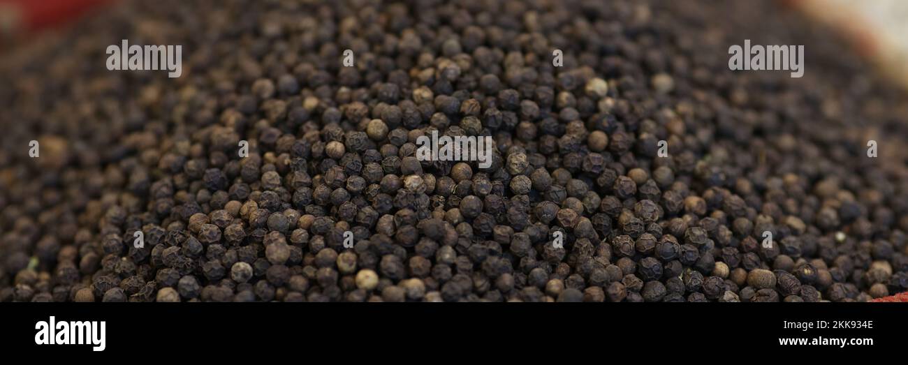Bunch of black pepper, tiny round food ingredient, spice, seasoning, taste Stock Photo