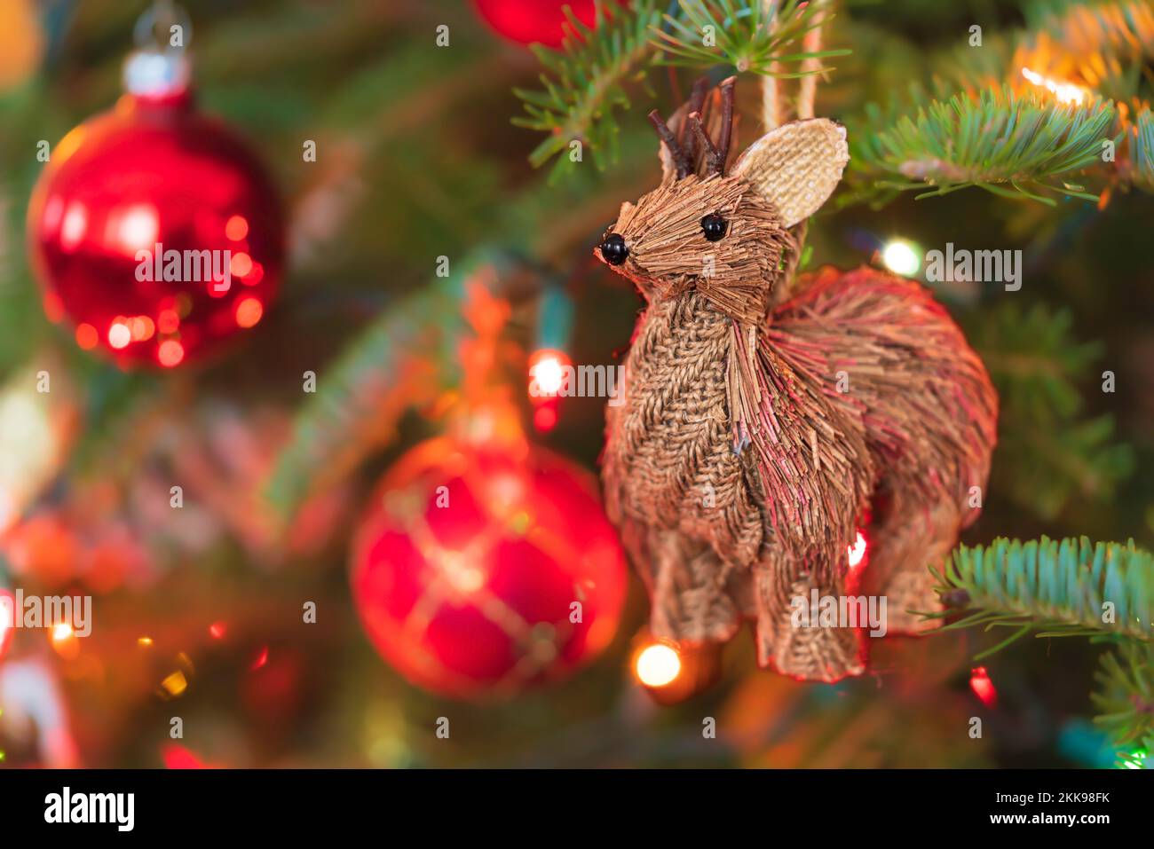 Rustic deer wooden twig Christmas ornament. Stock Photo