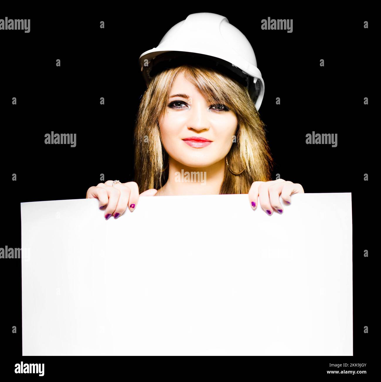 Isolated Photograph Of A Female Architect Wearing Hard Hat While