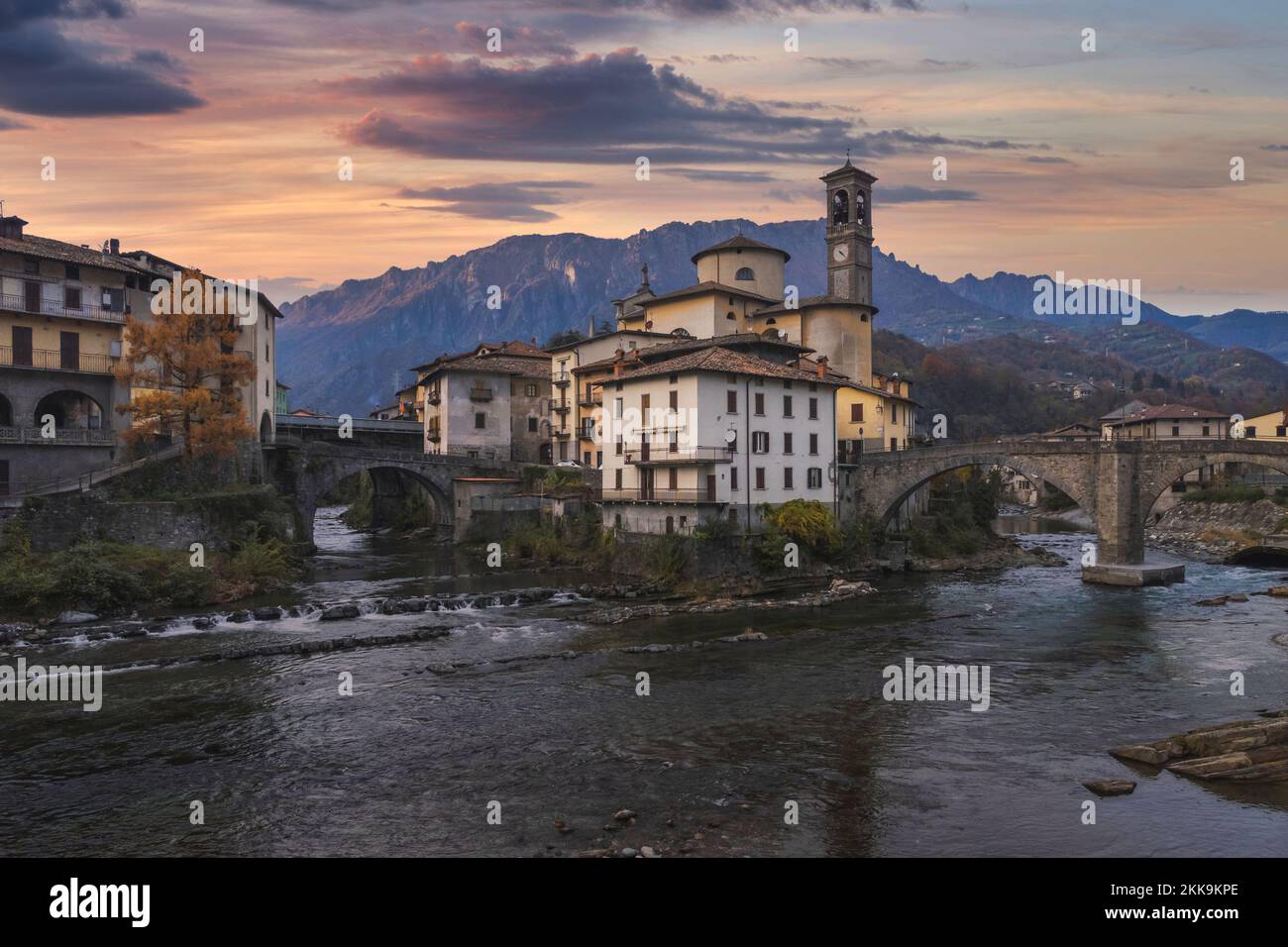 Beautiful sunset cityscape of little town in Bergamo, San Giovanni Bianco, Bergamo, Val Brembana, Lombardy, Italy Stock Photo