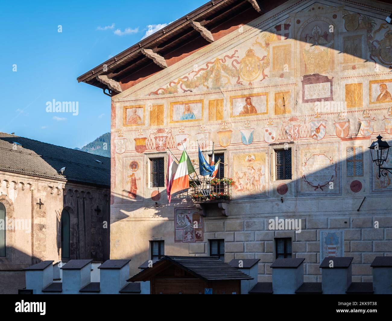 The frescoed facade of the Magnificent Community of Fiemme Palace, - 15th century -  Cavalese, Fiemme Valley, Trentino-Alto Adige, Italy, Stock Photo