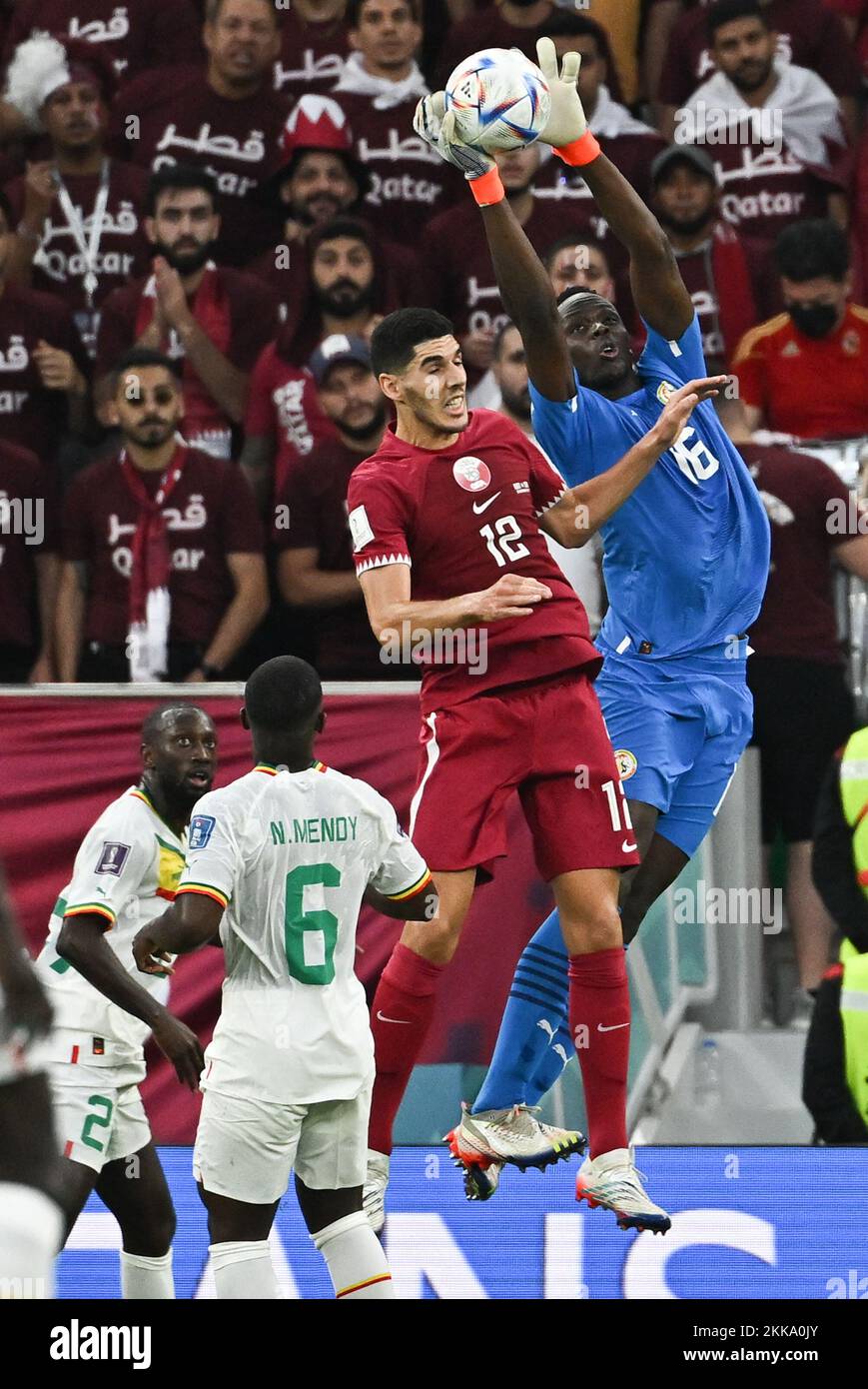 Karim Boudiaf of Qatar and Alfred Gomis of Senegal during Qatar v Senegal match of the Fifa World Cup Qatar 2022 at Thumama Stadium in Doha, Qatar on November 25, 2022. Photo by Laurent Zabulon/ABACAPRESS.COM Stock Photo