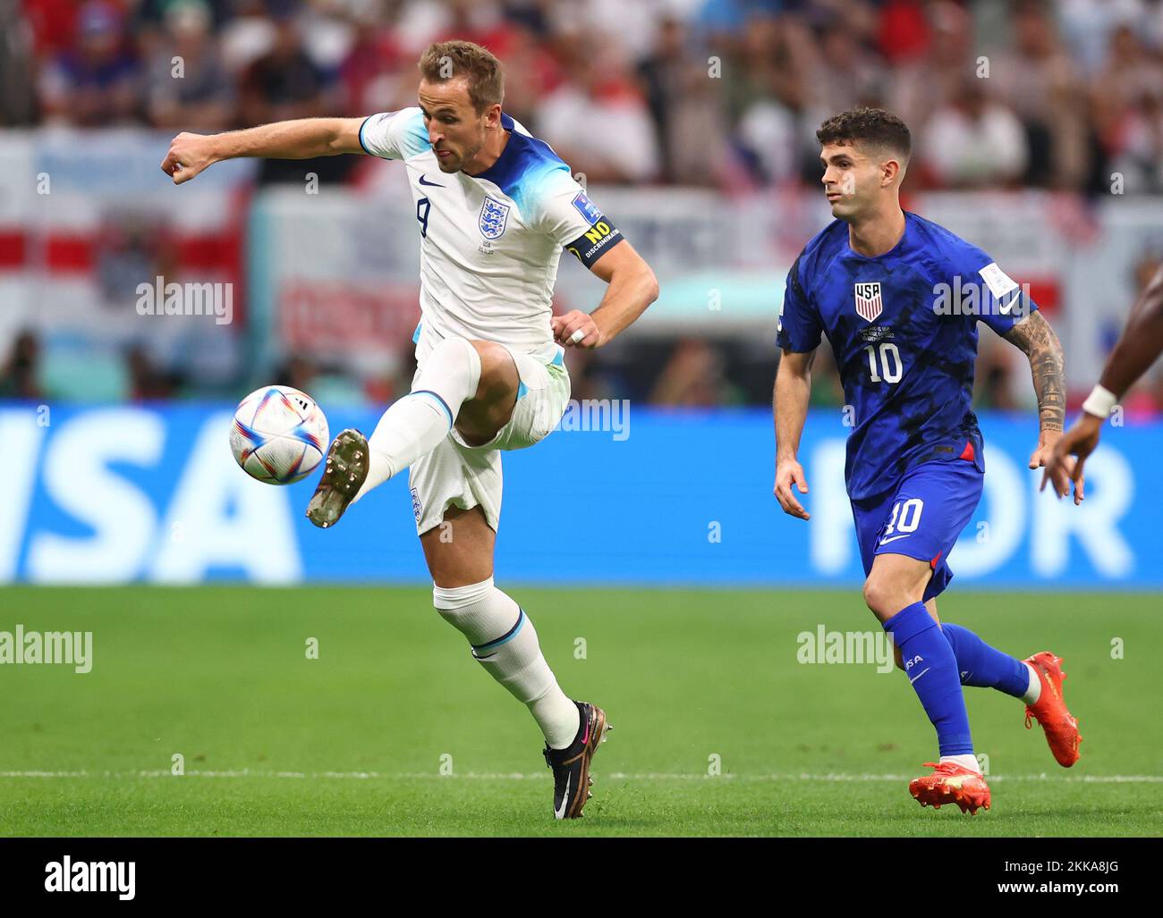Al Khor, Qatar, 25th November 2022. Harry Kane of England controls the ball in front off Christian Pulisic of USA  during the FIFA World Cup 2022 match at Al Bayt Stadium, Al Khor. Picture credit should read: David Klein / Sportimage Credit: Sportimage/Alamy Live News Credit: Sportimage/Alamy Live News Credit: Sportimage/Alamy Live New Credit: Sportimage/Alamy Live News Stock Photo