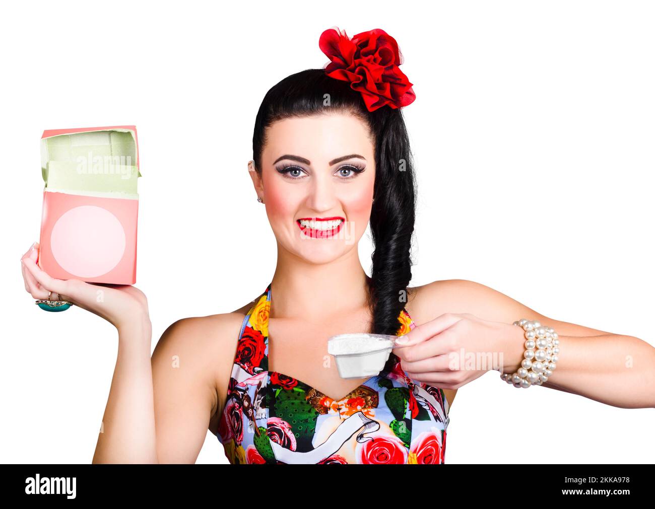 Smiling pin up cleaning lady holding open detergent box when using