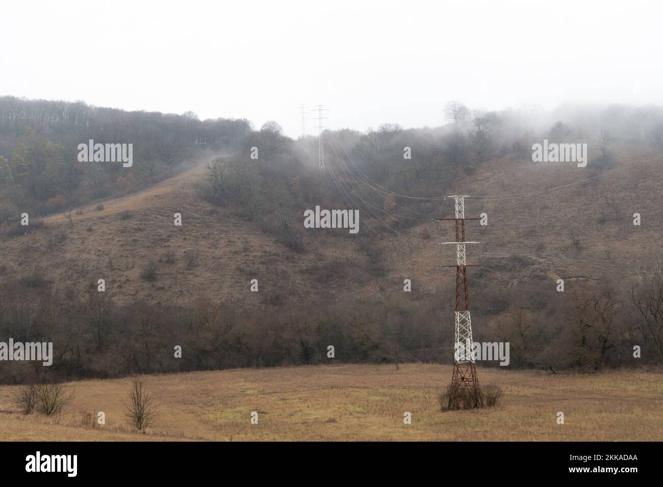 Romania, 2021-12-31. Mountainous landscape in the Bucovina region with mist. Stock Photo
