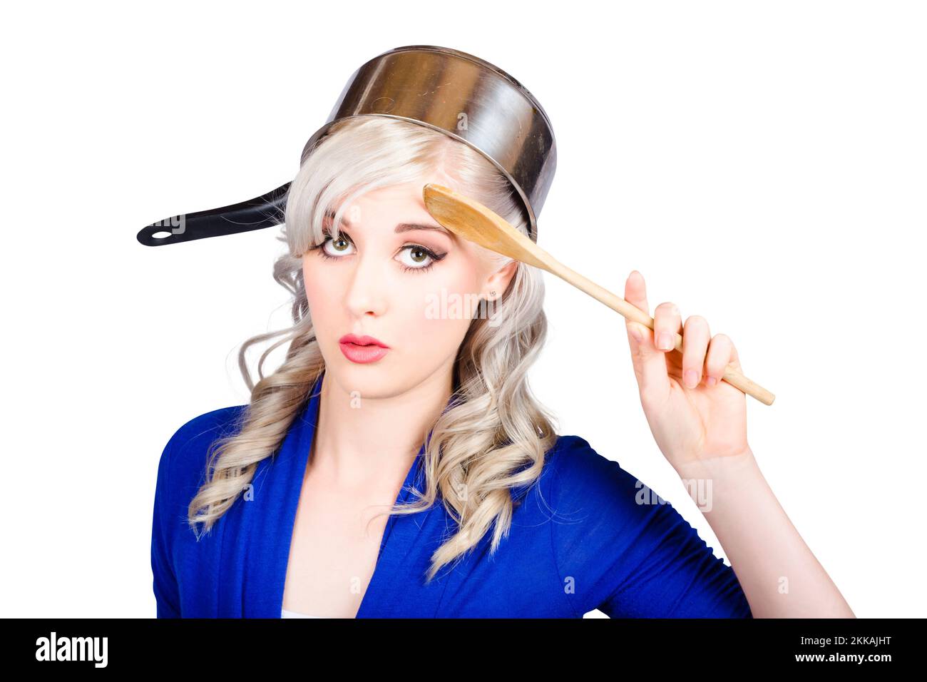 Funny photograph of a beautiful blond pin up housewife with curly blond