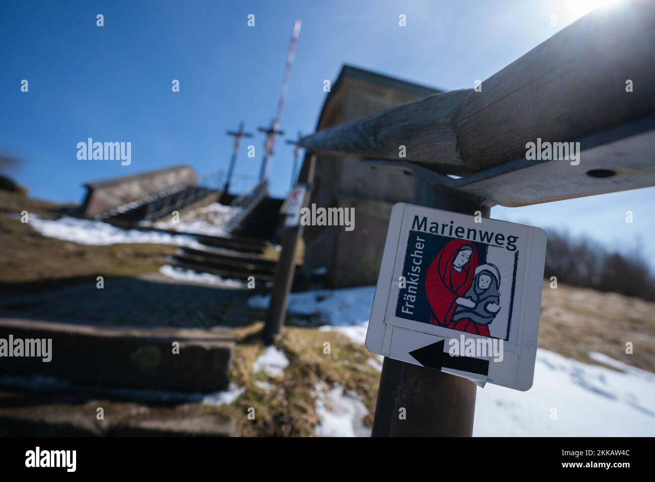 PRODUCTION - 11 April 2022, Bavaria, Bischofsheim In Der Rhön: A staircase leads to the three Golgotha crosses on Cross Mountain. The mountain is a popular destination for pilgrims every year. Photo: Nicolas Armer/dpa Stock Photo