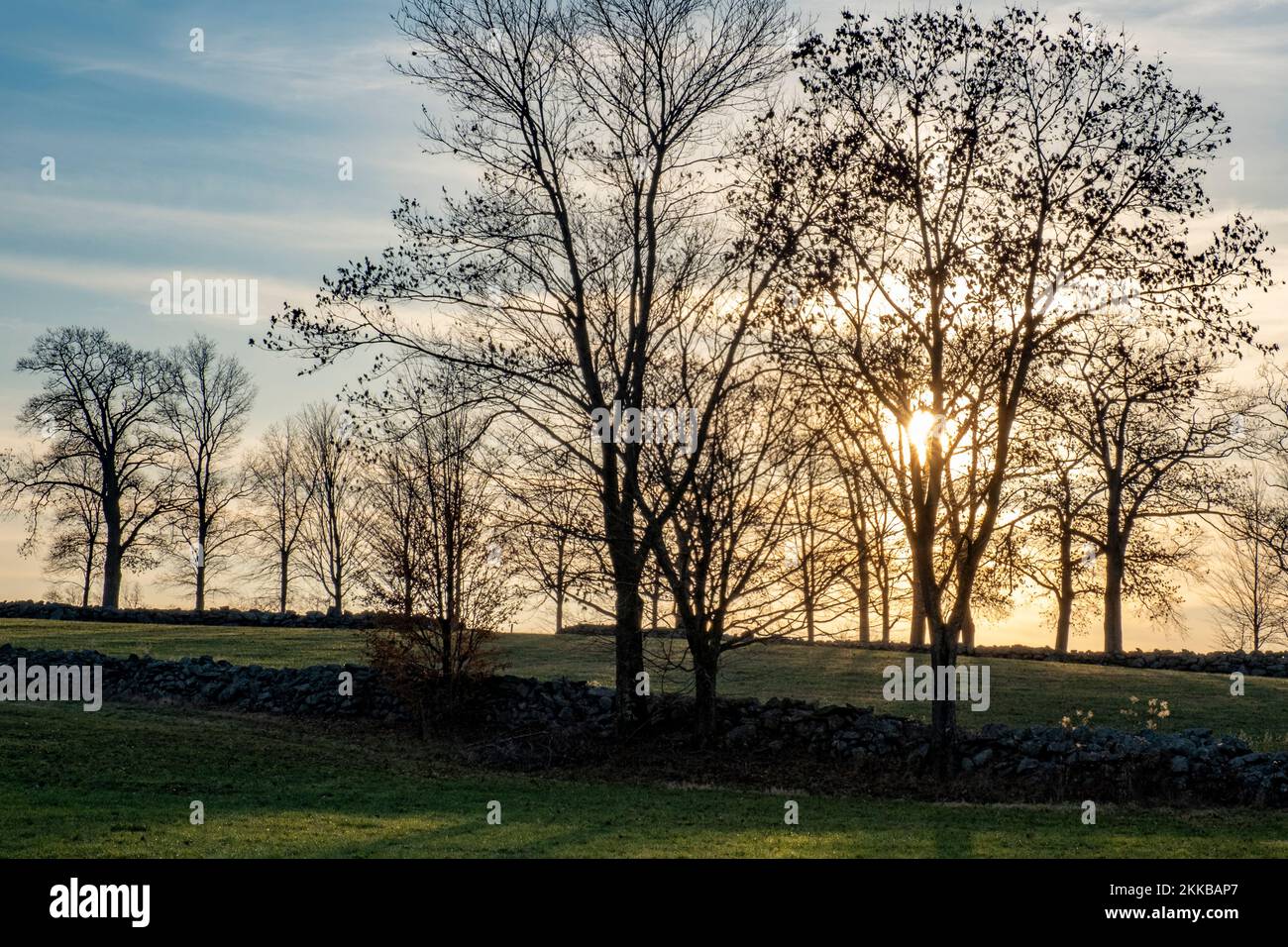 Sunset over a pasture in Hardwick, Massachusetts Stock Photo
