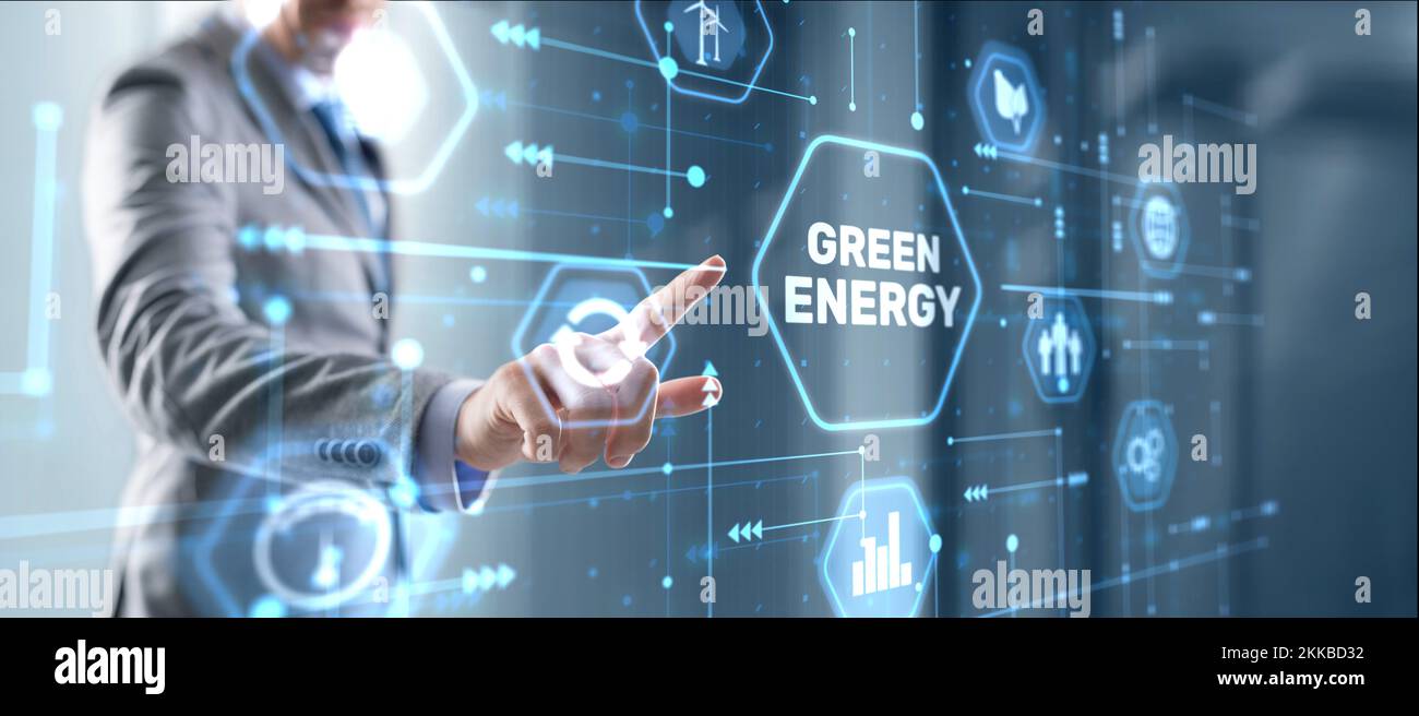 Businessman clicks Green eco energy icons. Reducing environmental risks. Stock Photo