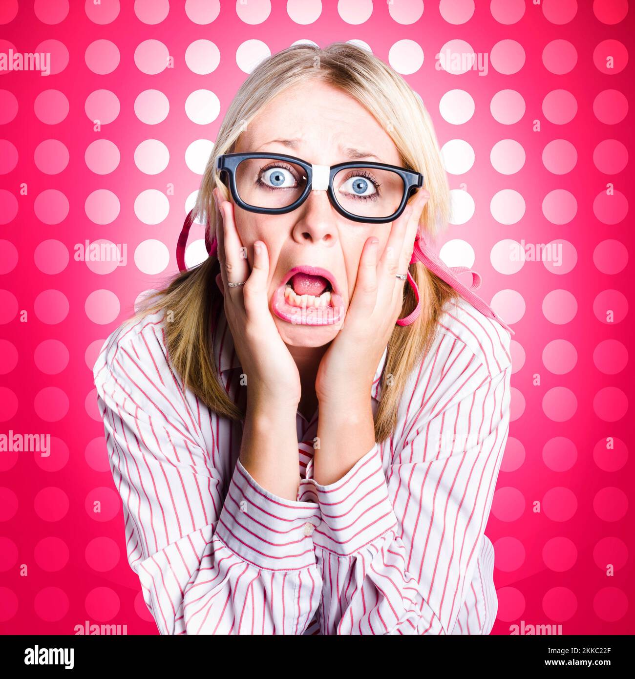 Frightened dorky business person screaming out in fear and alarm during