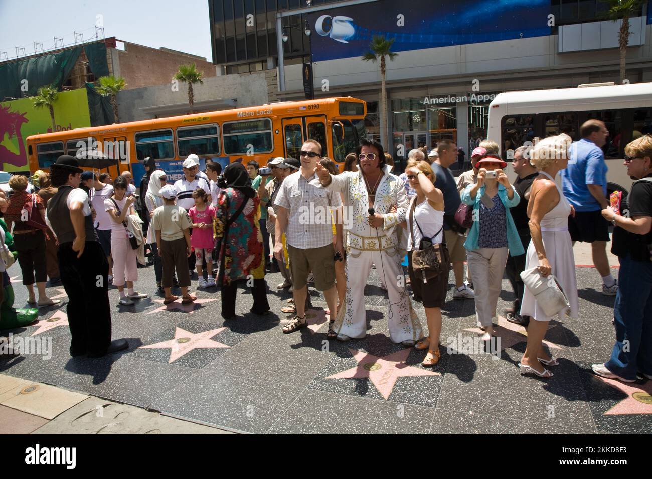 Hollywood, USA - July 5, 2008: actors are dressed as Hollywood doubles and offer Photos with tourists for money. Stock Photo