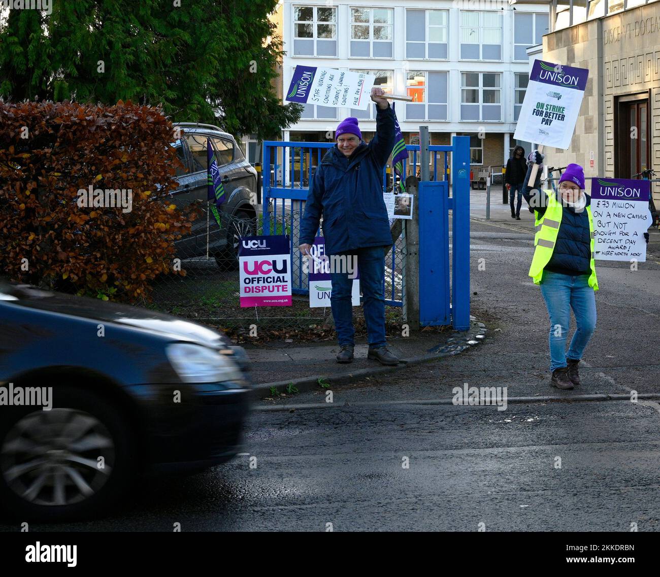 Cheltenham, UK. 25th Nov, 2022. 25th November 2022. Cheltenham, UK. Protesters hold signs outside of Park Campus as cars drive past. The University and College Lecturers Union have begun industrial action on the grounds of pay and conditions in a dispute expected to last well into 2023 (Annabel Lee-Ellis/Pathos) Credit: Pathos Images/Alamy Live News Stock Photo