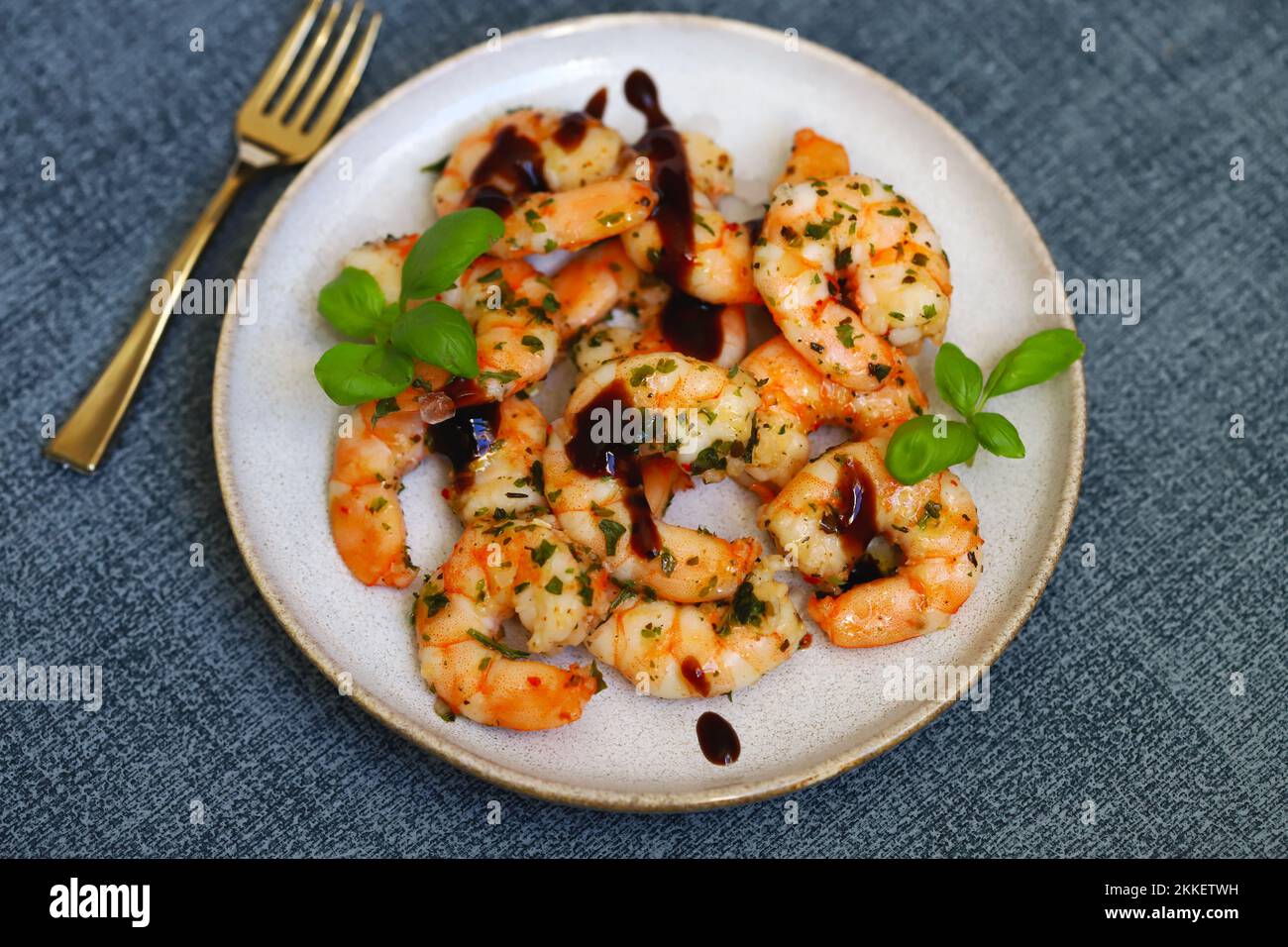 Asian style cooked shrimp with hot spices on a plate. Stock Photo