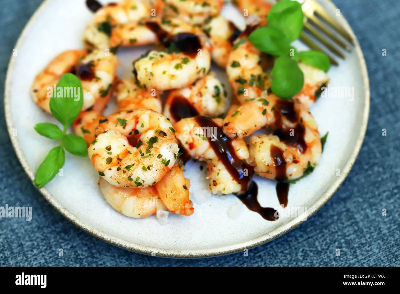 Asian style cooked shrimp with hot spices on a plate. Stock Photo