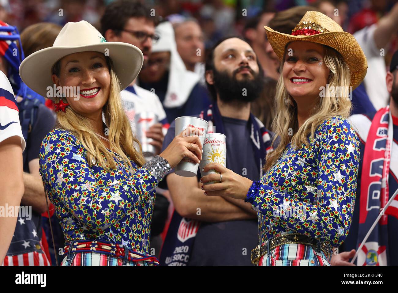 Doha, Qatar. 25th Nov, 2022. USA fans toast with nonalcoholic beer