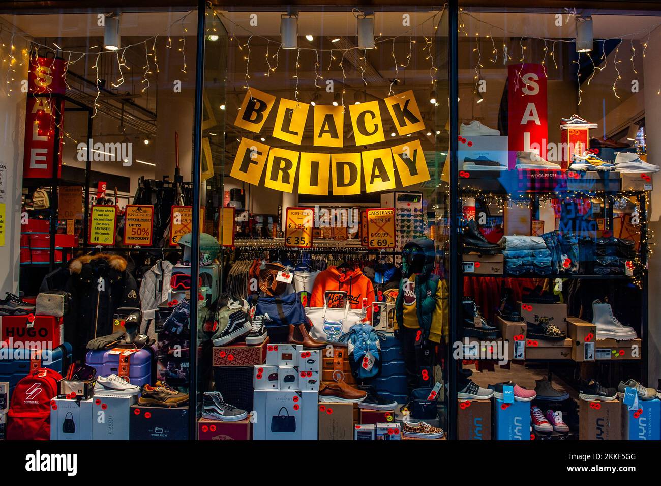 Amsterdam, Netherlands. 25th Nov, 2022. A view of a shop window with a  banner of Black Friday on the top of the window. In Amsterdam, shops are  ready with deals and store