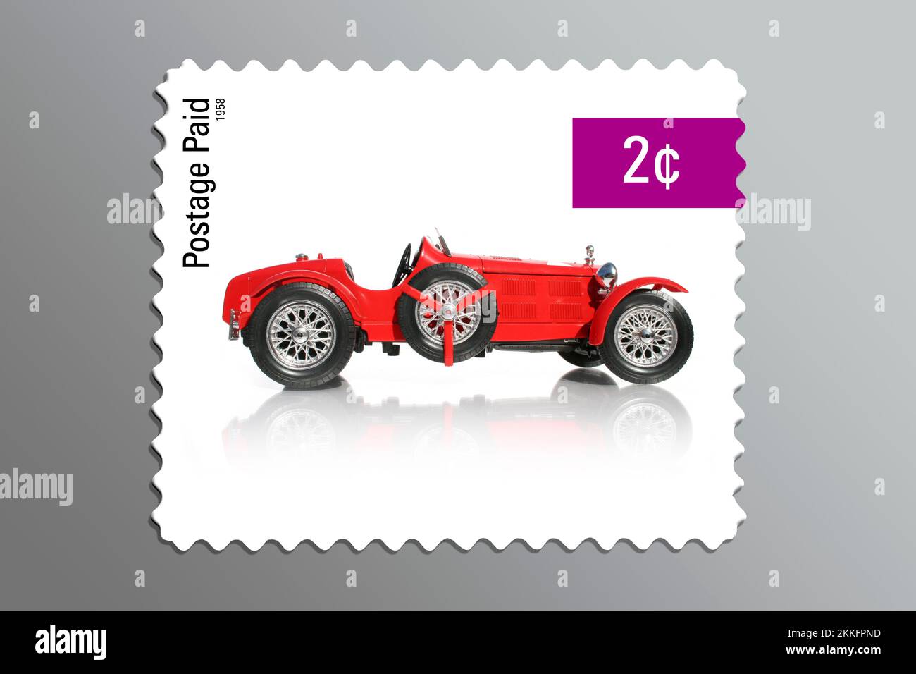 Two Cent Mail Postage Stamp On A Classic Red Car Stock Photo