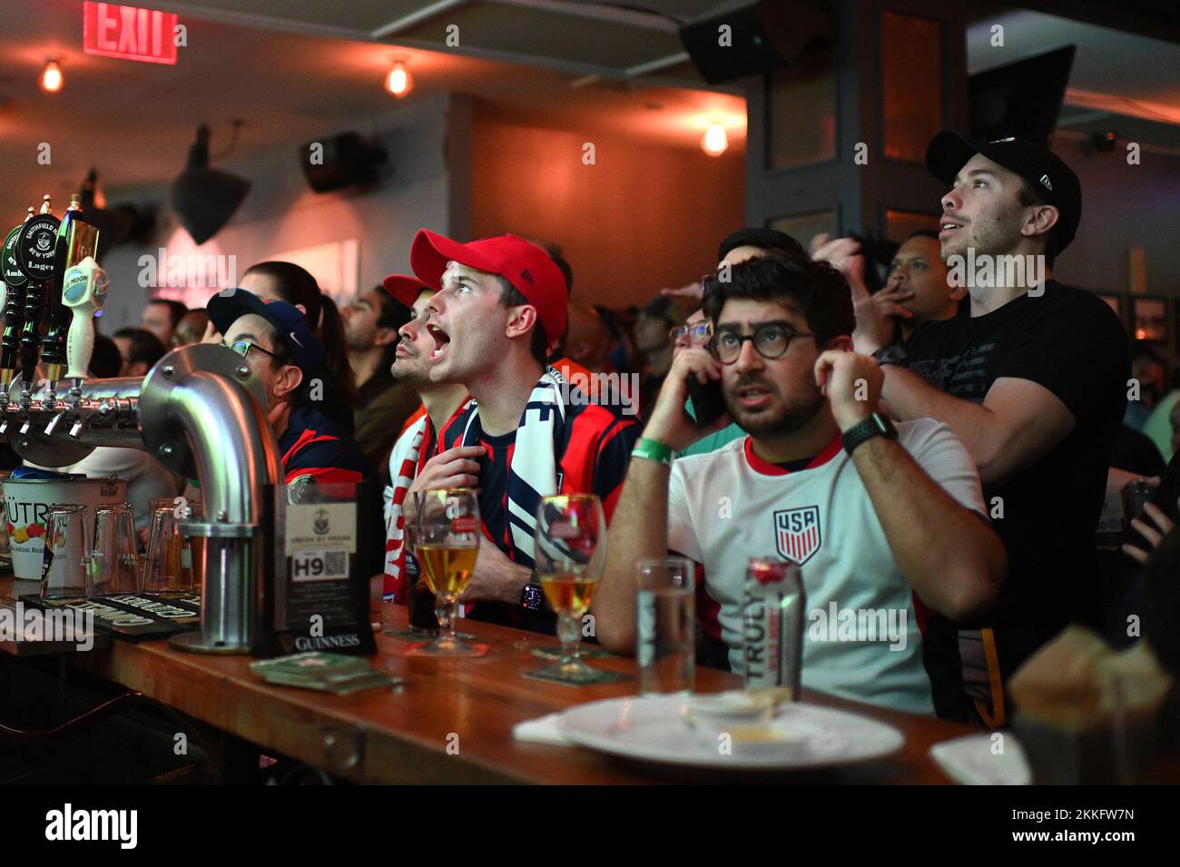 New York, USA. 25th Nov, 2022. Soccer fans watch the USA vs. England match at a World Soccer Cup watch party at Smithfield Hall, New York, NY, November 25, 2022. (Photo by Anthony Behar/Sipa USA) Credit: Sipa USA/Alamy Live News Stock Photo