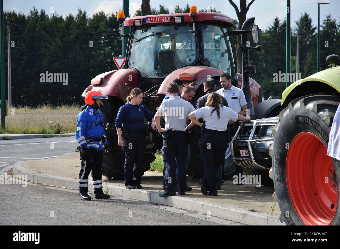 07-30-2015.Lessines,Belgium.Farmers protesting low milk and meat prices ,blocking traffic near the Colruyt distribution center Stock Photo