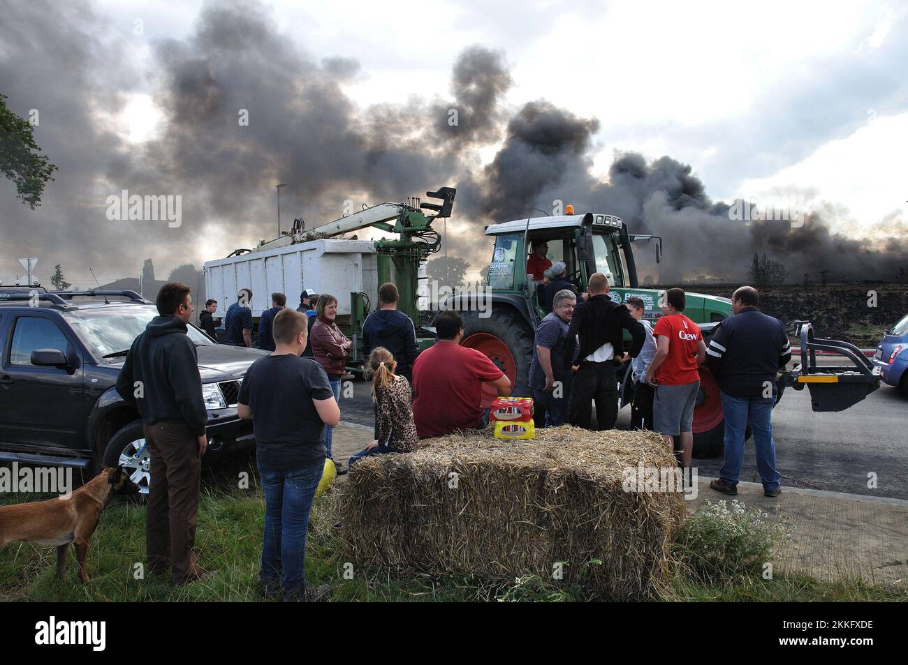 07-30-2015.Lessines,Belgium.Farmers protesting low milk and meat prices ,blocking traffic near the Colruyt distribution center Stock Photo