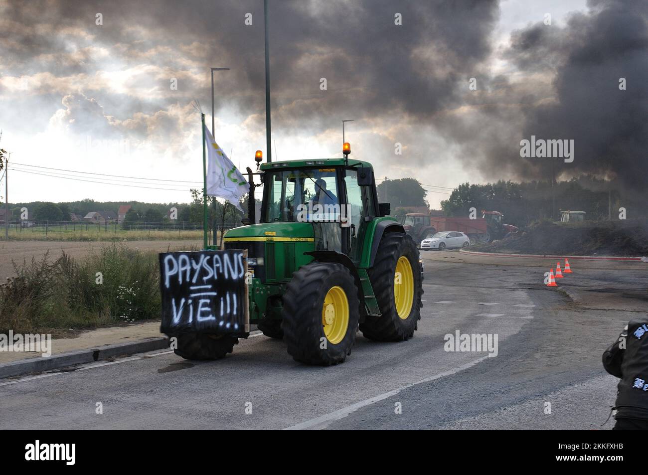 07-30-2015.Lessines,Belgium.Farmers protesting low milk and meat prices ,blocking traffic near the Colruyt distribution center Stock Photo