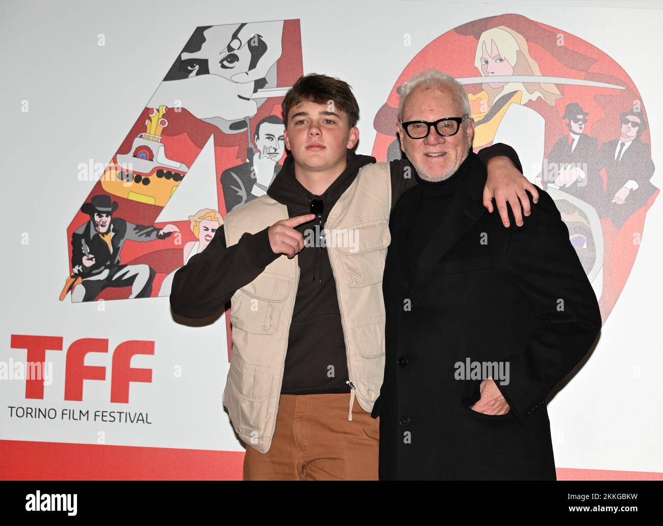 Turin, Italy. 25th Nov, 2022. Torinoi, Italy Torino Film Festival 40th edition photocall In the picture:Malcolm McDowell with son Beckett Taylor Credit: Independent Photo Agency/Alamy Live News Stock Photo