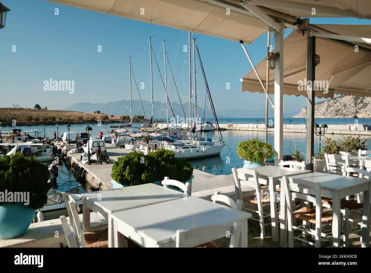 The small port of Perdika in Aegina, Greece. A common stop over port on sailing holidays in the Saronic Gulf. Stock Photo